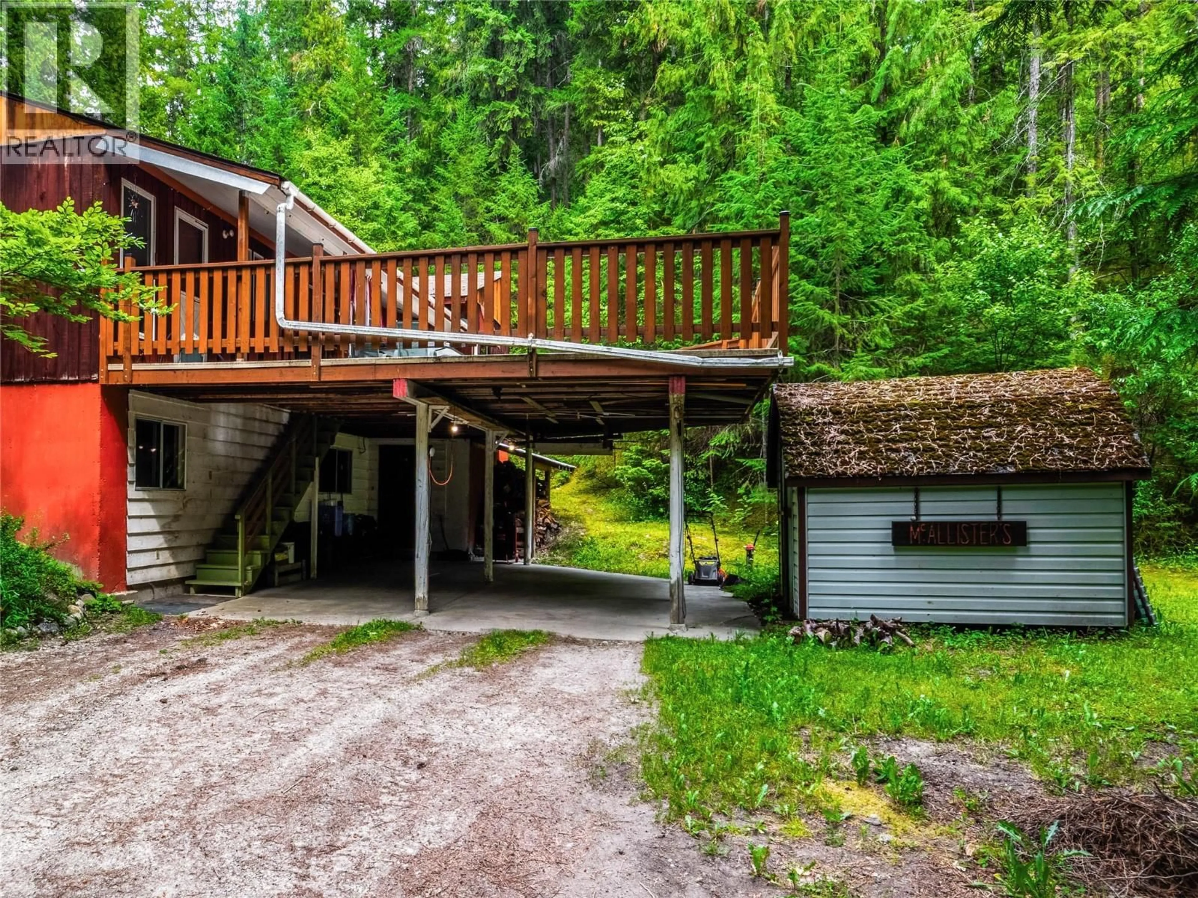 A pic from outside/outdoor area/front of a property/back of a property/a pic from drone, unknown for 8043 97A HIGHWAY, Mara British Columbia V0E2K0