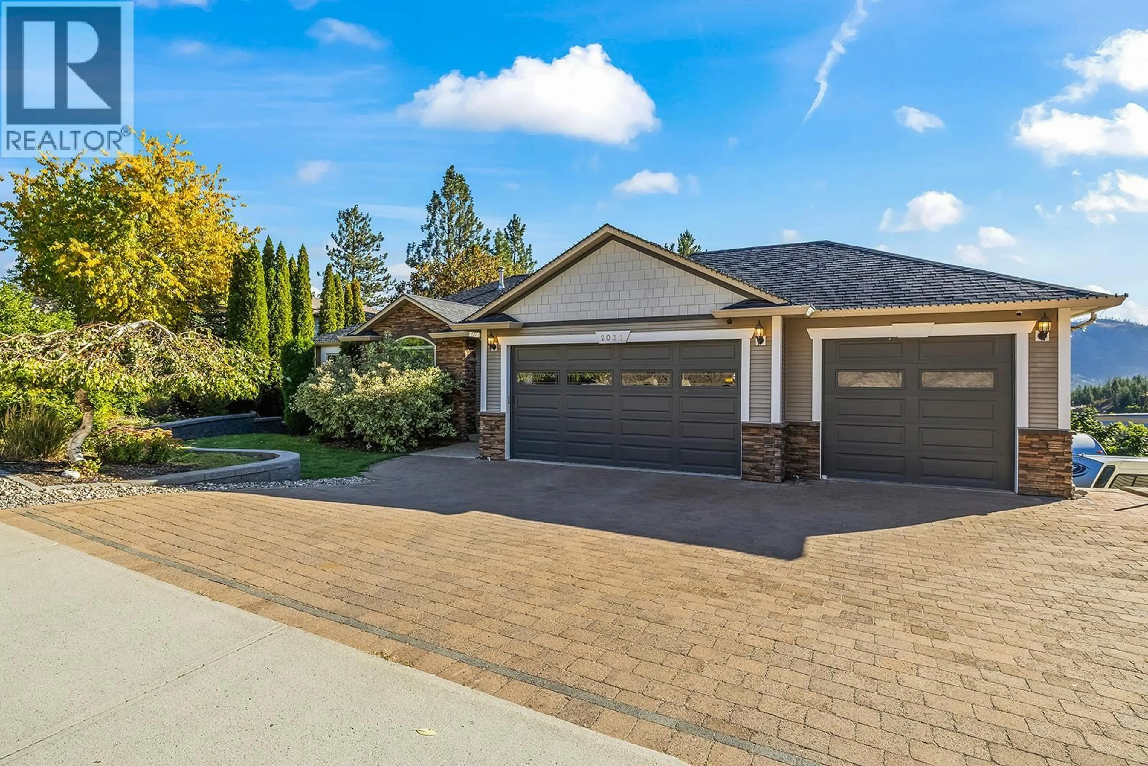Home with brick exterior material, street for 2031 ROSEALEE LANE, West Kelowna British Columbia V1Z3Z5