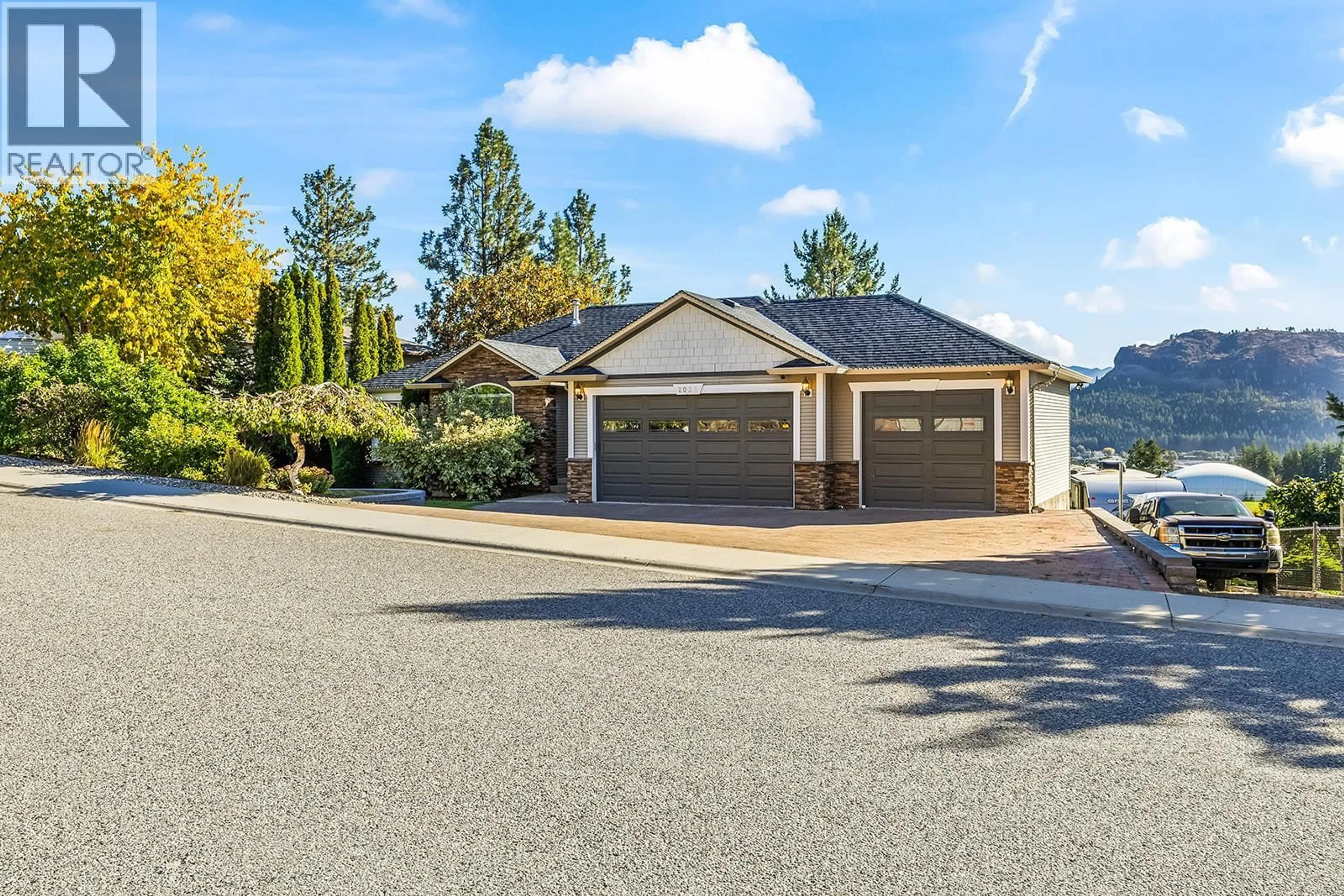 Home with vinyl exterior material, street for 2031 ROSEALEE LANE, West Kelowna British Columbia V1Z3Z5