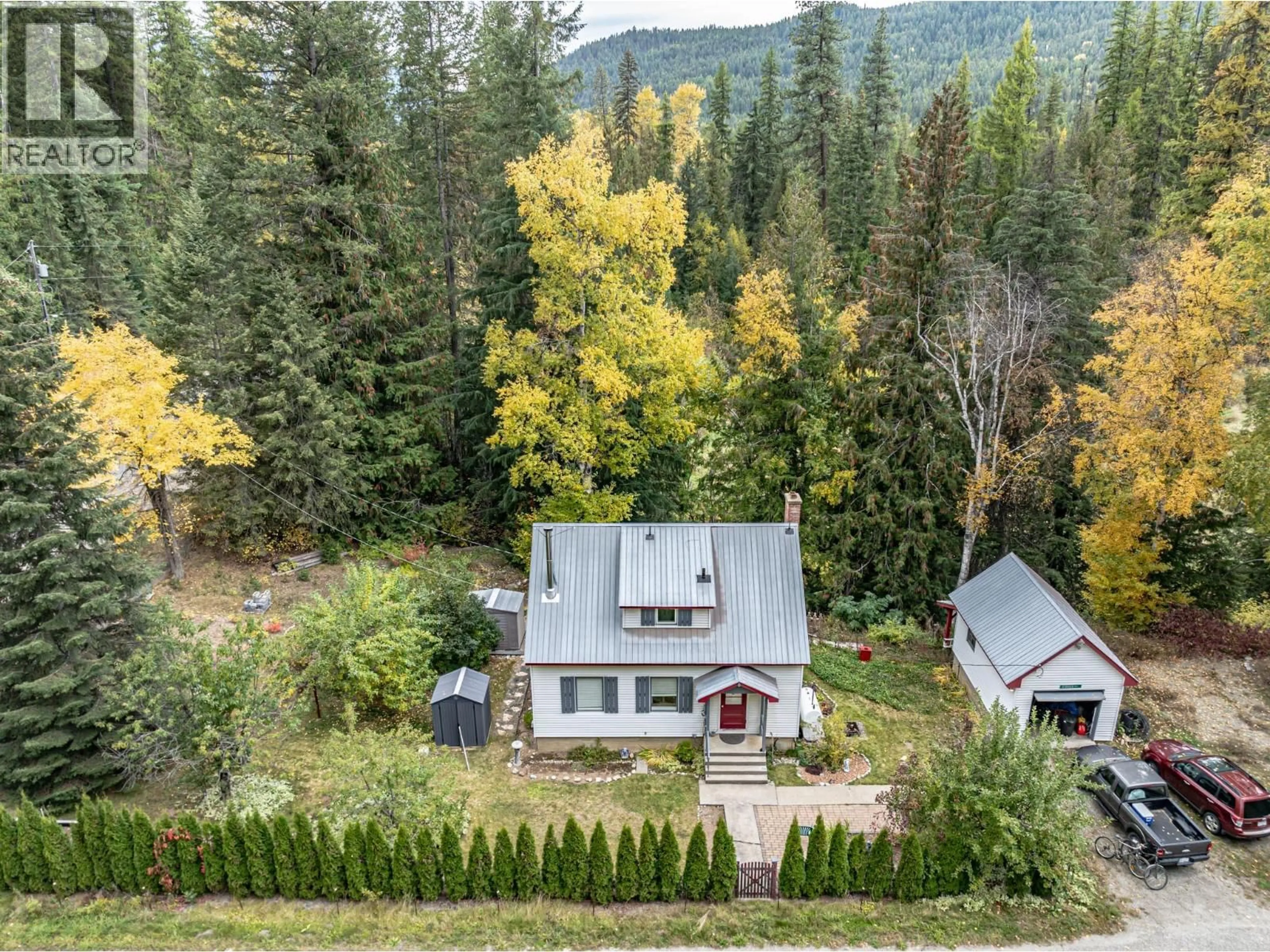 A pic from outside/outdoor area/front of a property/back of a property/a pic from drone, forest/trees view for 9990 HIGHWAY 6 OTHER, Nelway British Columbia V0G1Z0
