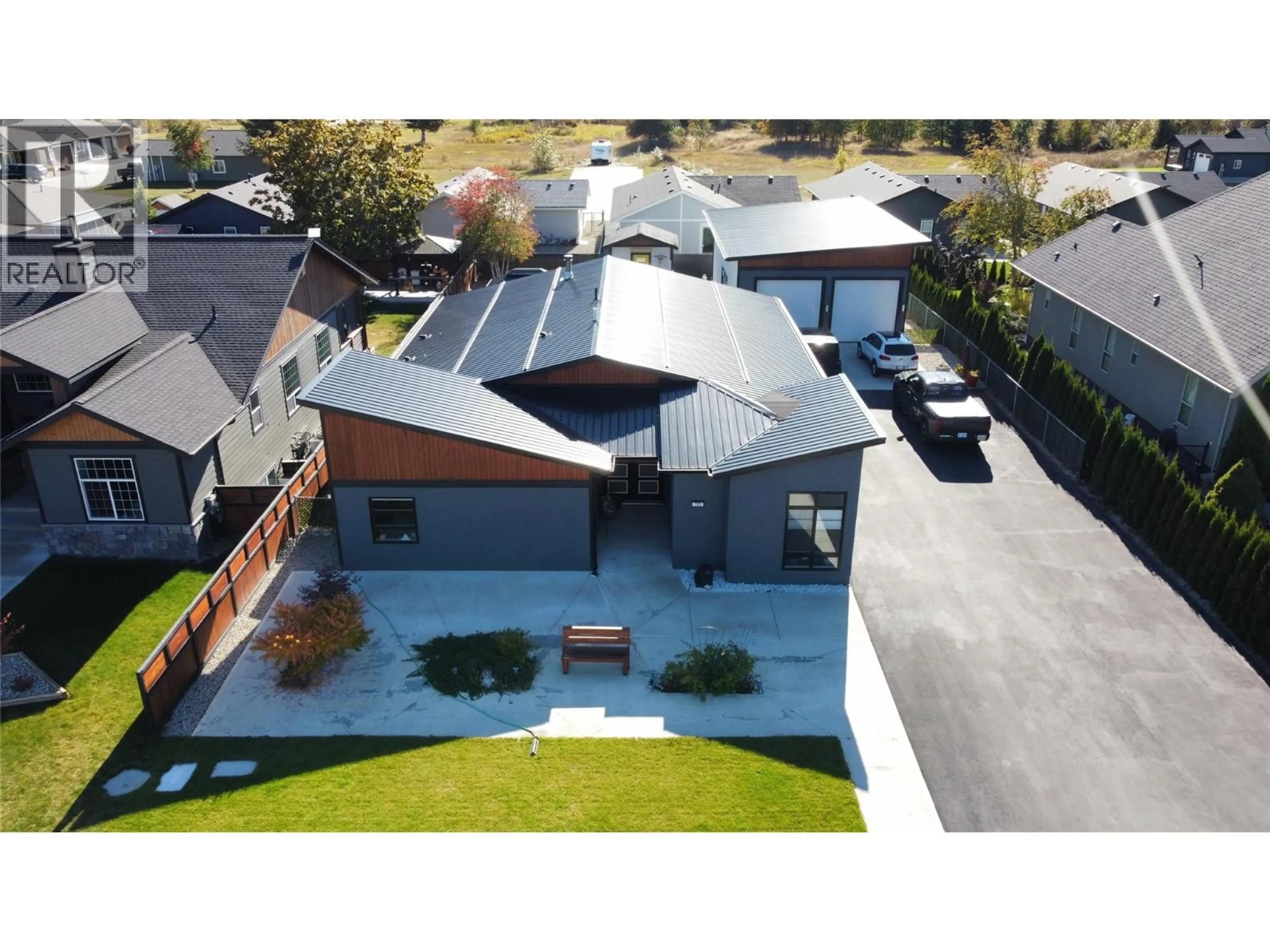 A pic from outside/outdoor area/front of a property/back of a property/a pic from drone, street for 731 PARKSVILLE STREET, Sicamous British Columbia V0E2V0