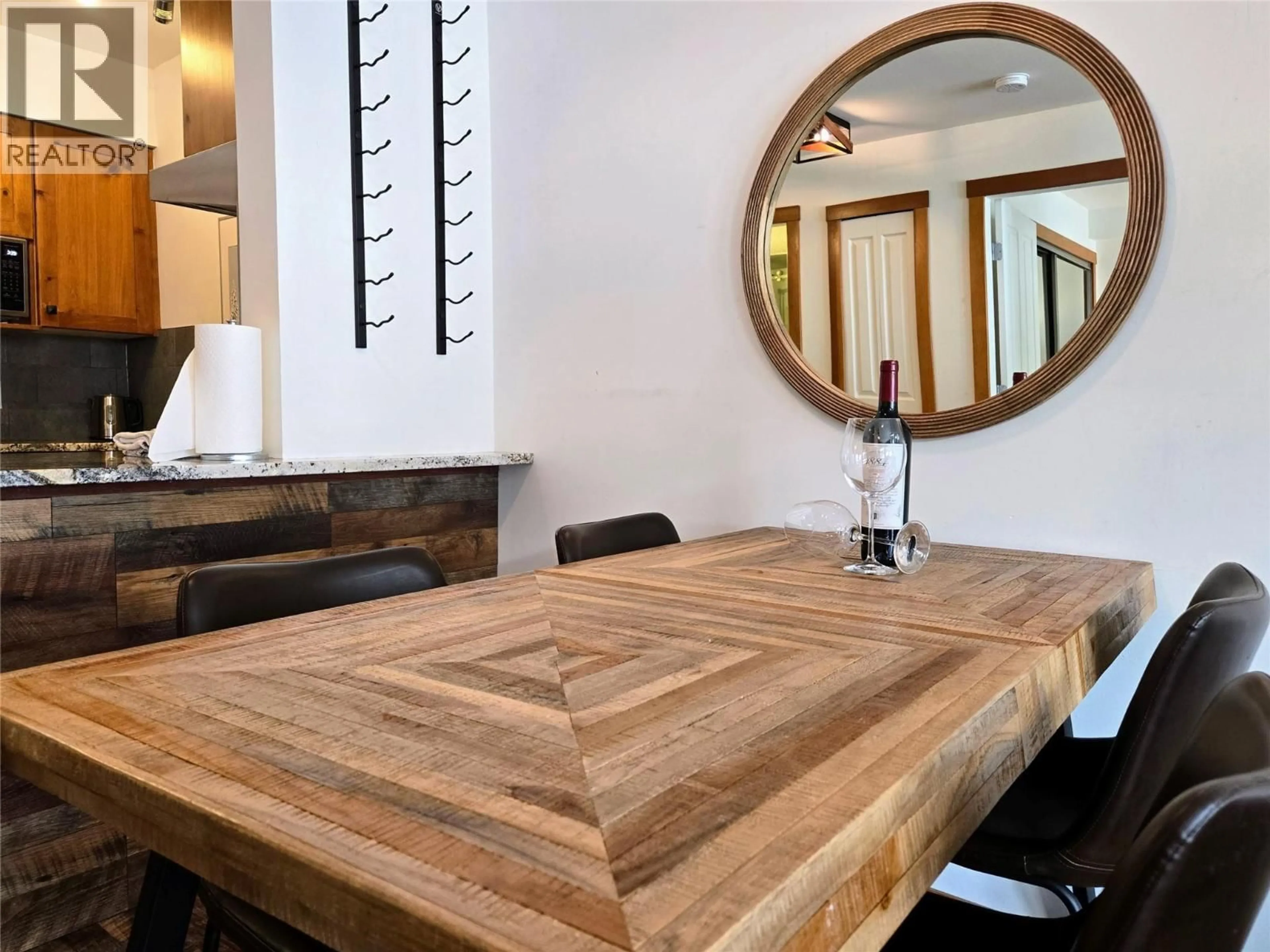 Dining room, wood/laminate floor for 201 - 2050 SUMMIT DRIVE, Panorama British Columbia V0A1T0