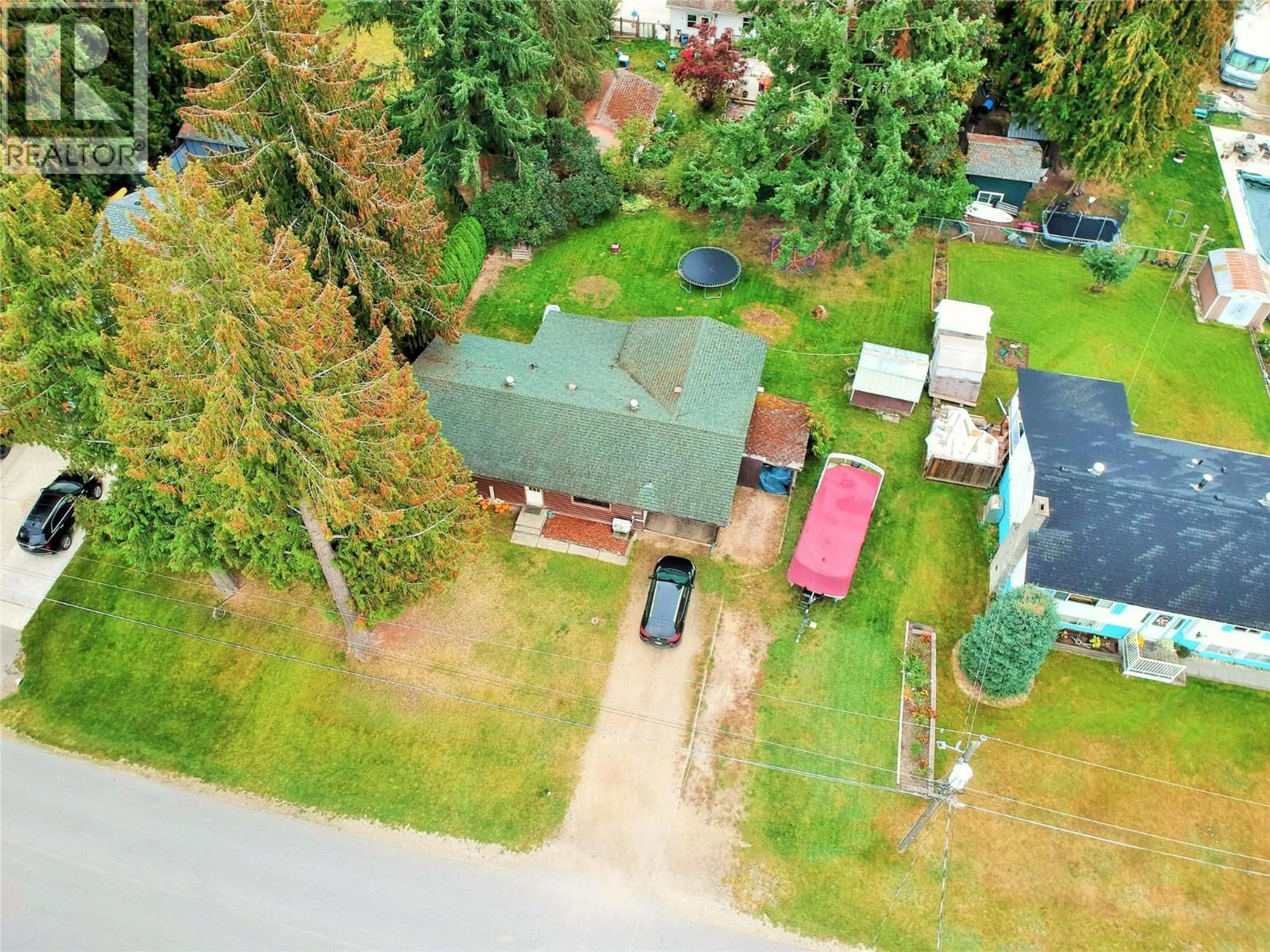 A pic from outside/outdoor area/front of a property/back of a property/a pic from drone, street for 613 PINE STREET, Sicamous British Columbia V0E2V0