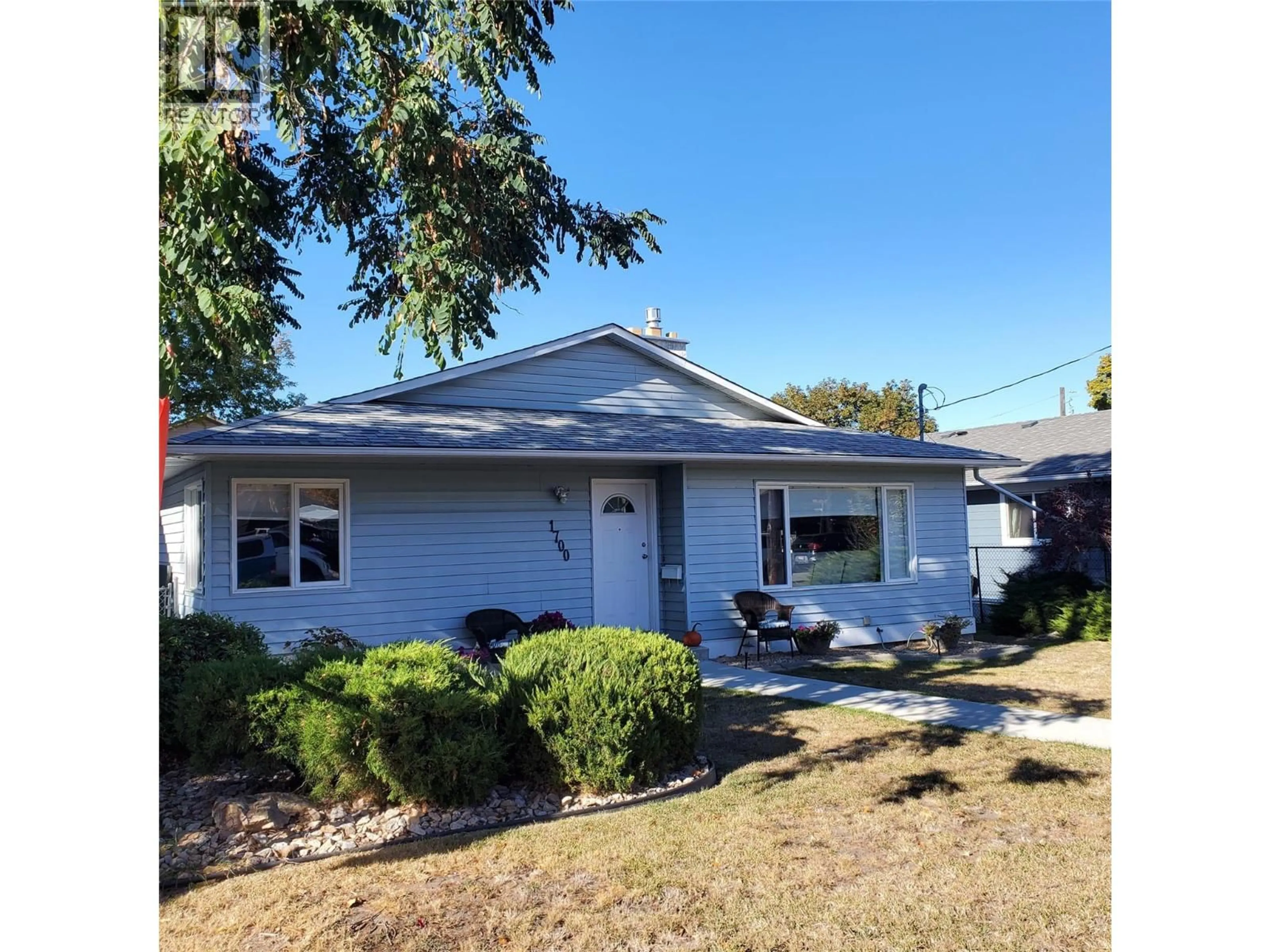 Home with vinyl exterior material, street for 1700 30 STREET, Vernon British Columbia V1T5C3