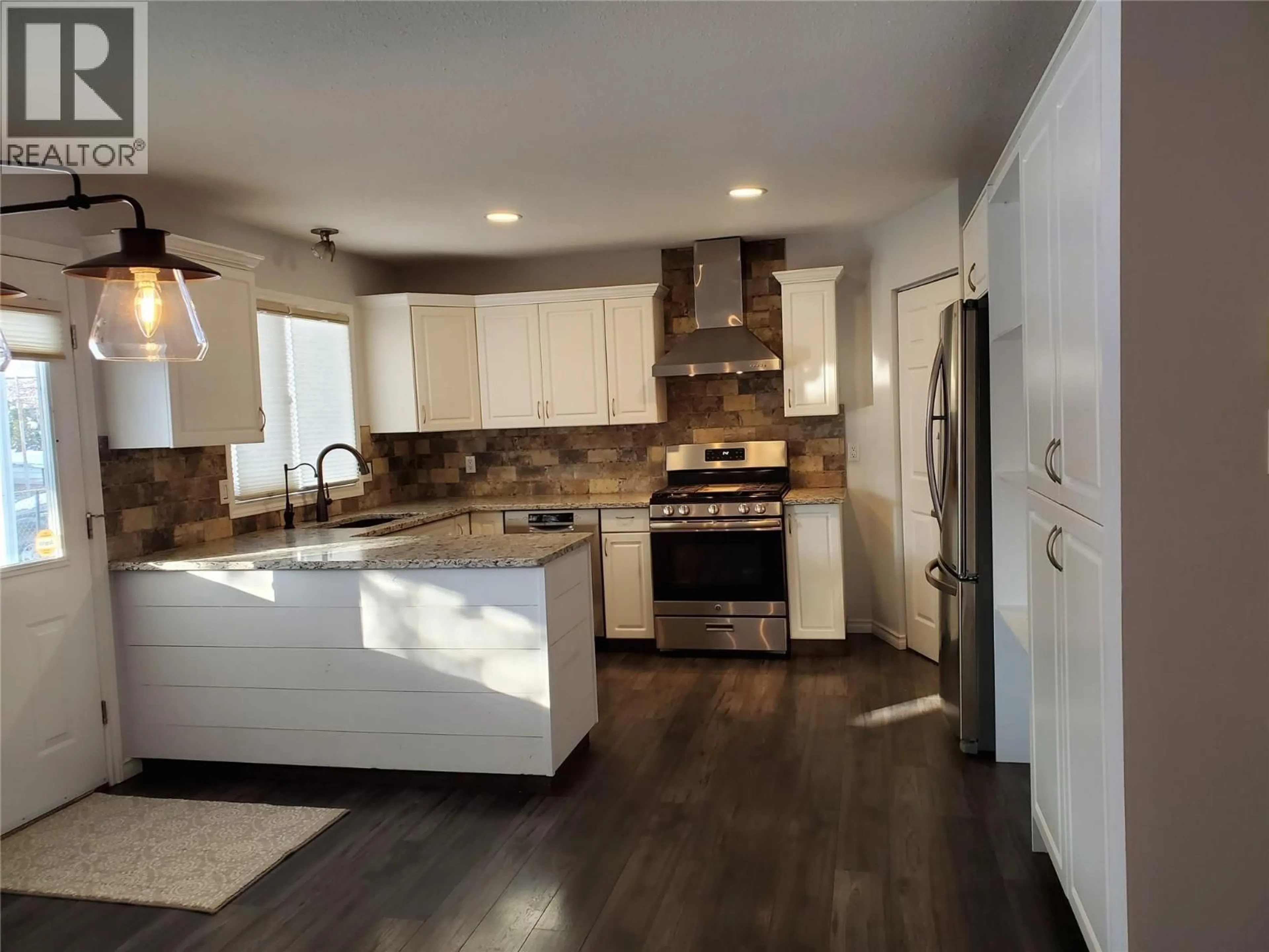 Open concept kitchen, unknown for 1700 30 STREET, Vernon British Columbia V1T5C3