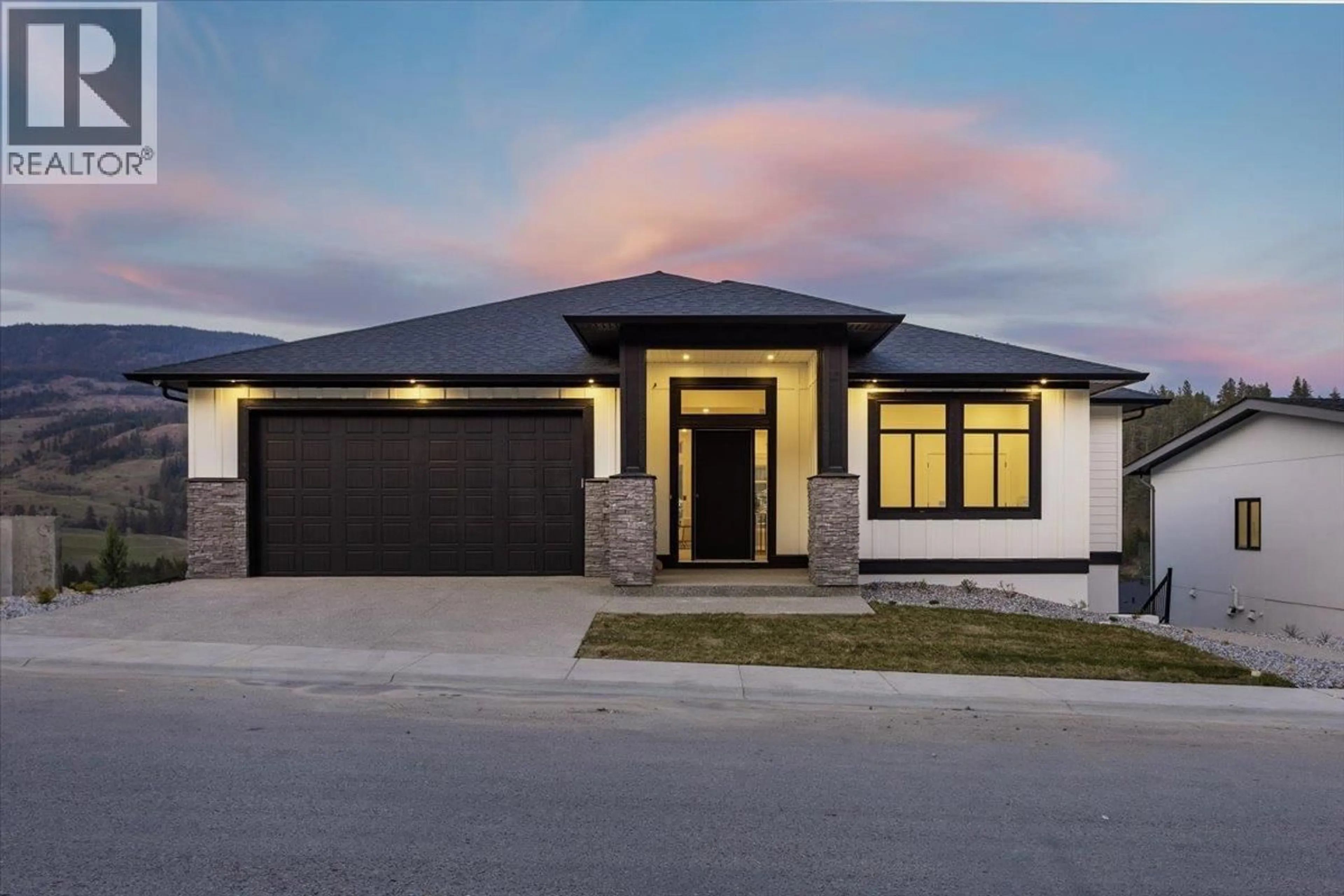 Home with brick exterior material, street for 913 CARNOUSTIE DRIVE, Kelowna British Columbia V1P0A3