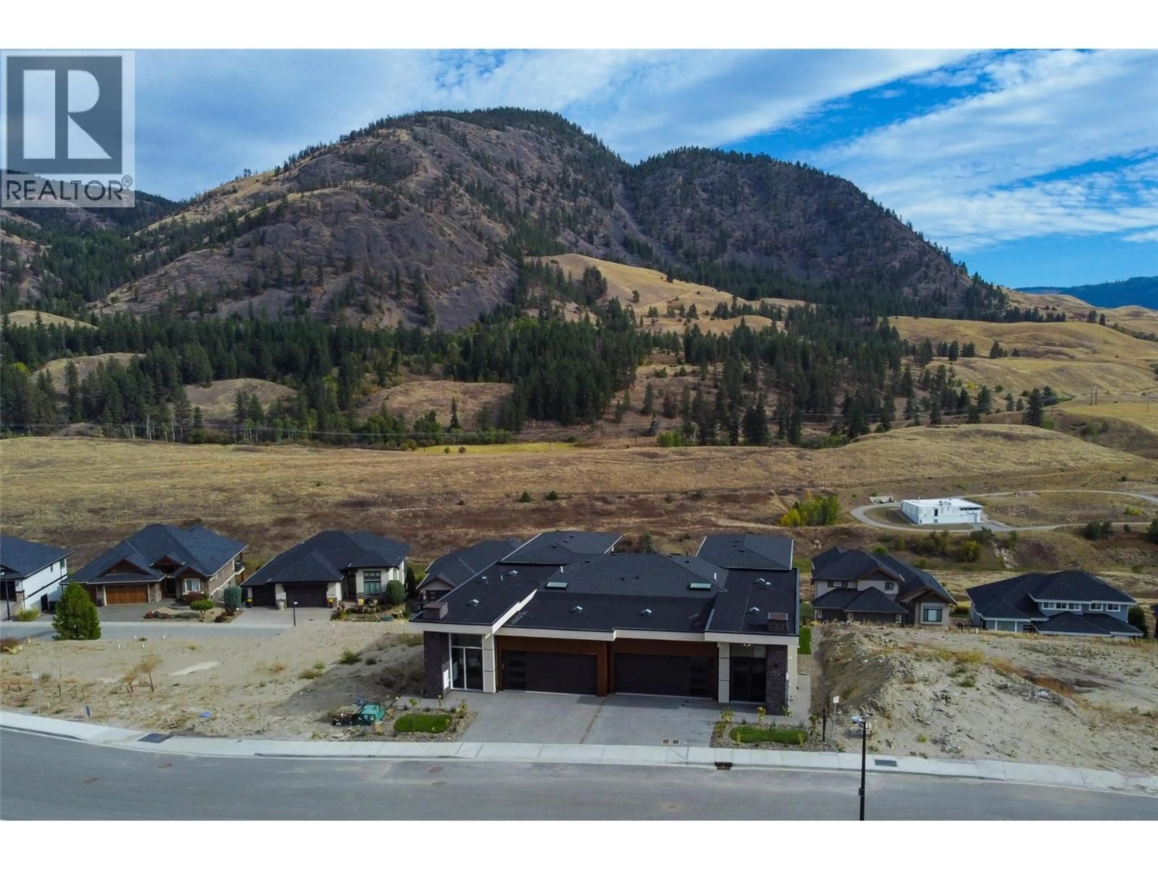 A pic from outside/outdoor area/front of a property/back of a property/a pic from drone, mountain view for 1123 GREENOCK COURT, Kelowna British Columbia V1P1R6