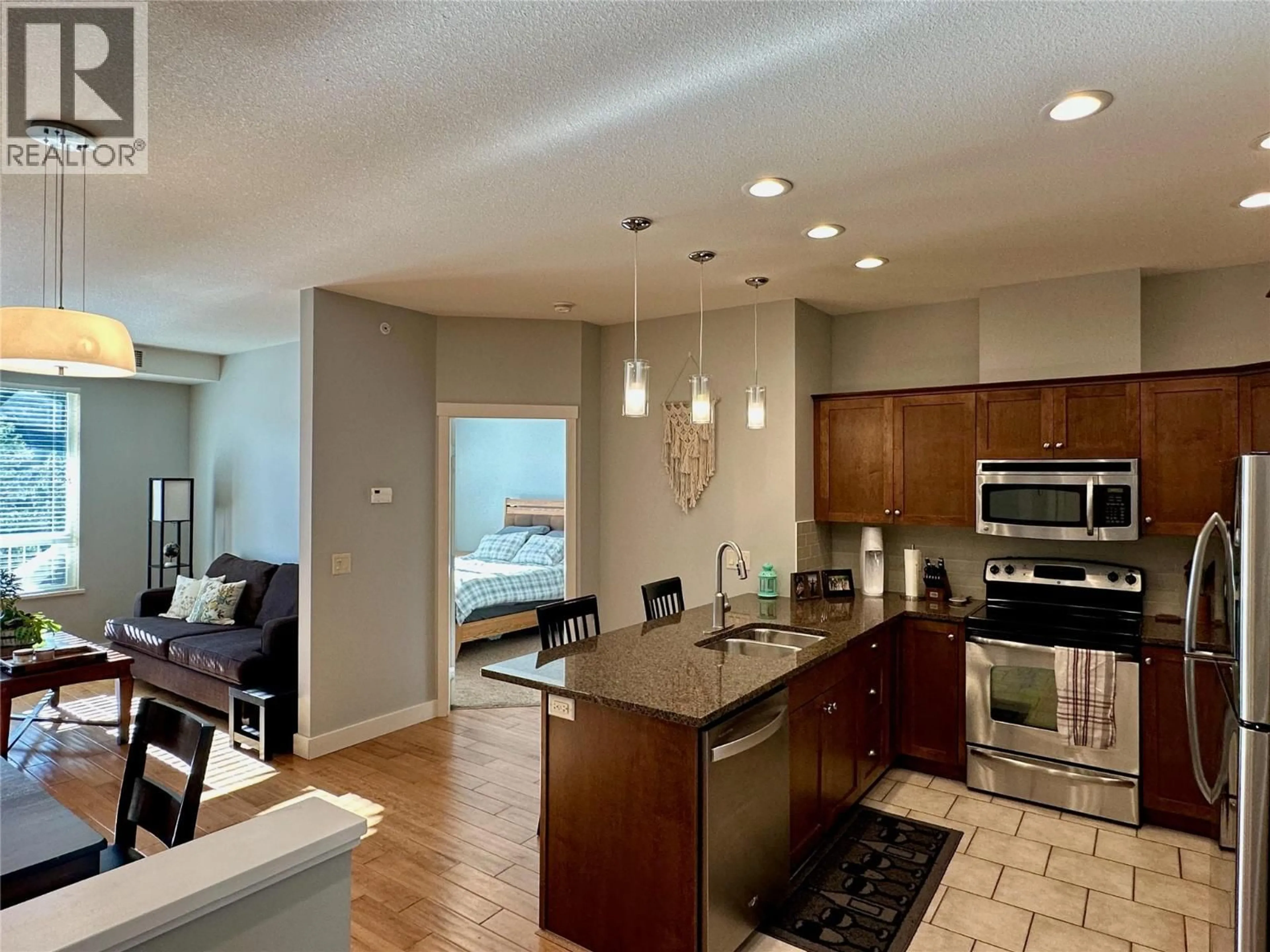 Open concept kitchen, ceramic/tile floor for 1309 - 2210 UPPER SUNDANCE DRIVE, West Kelowna British Columbia V4T3E9