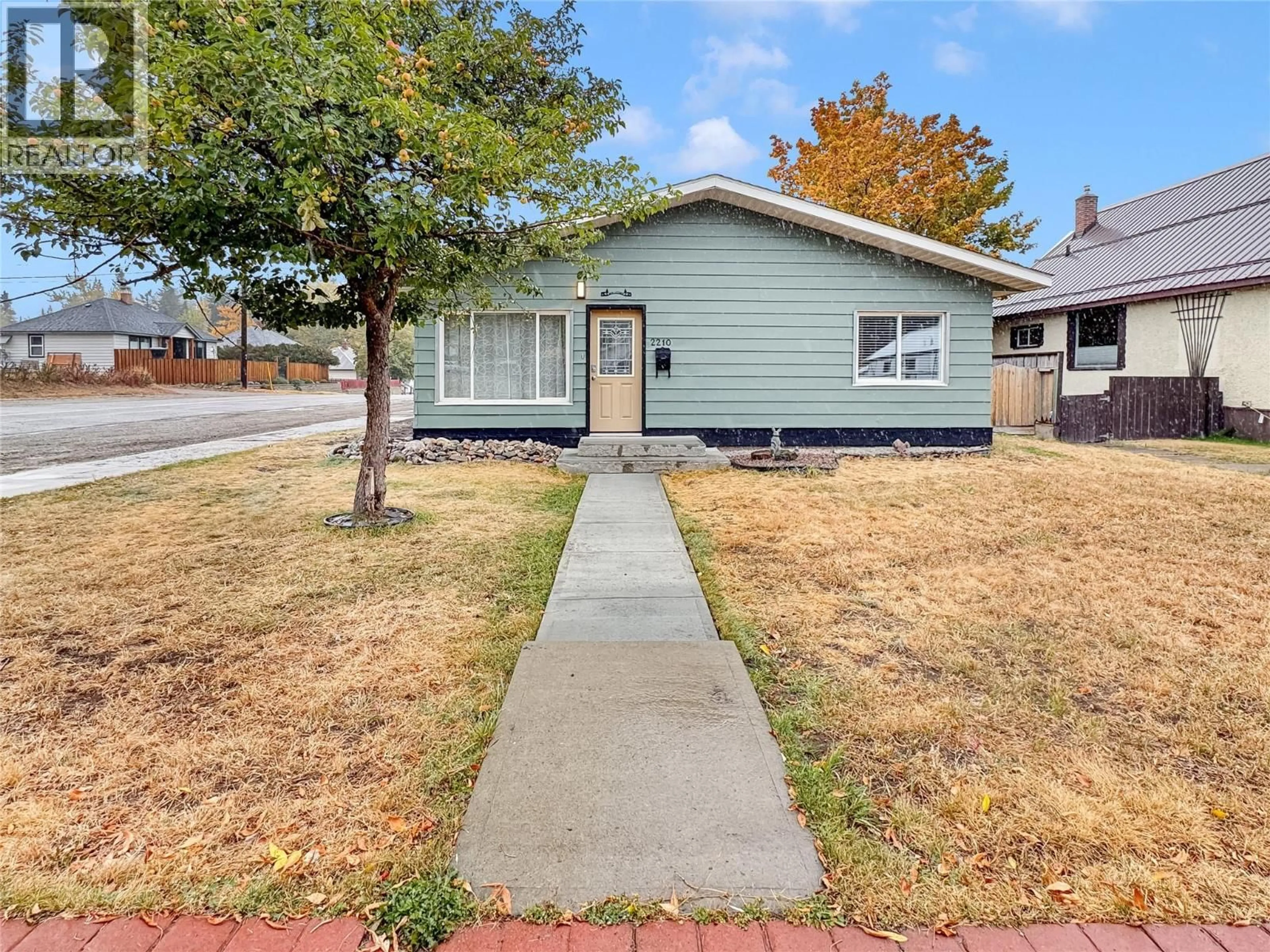 Home with vinyl exterior material, street for 2210 WARREN AVENUE, Kimberley British Columbia V1A1S9