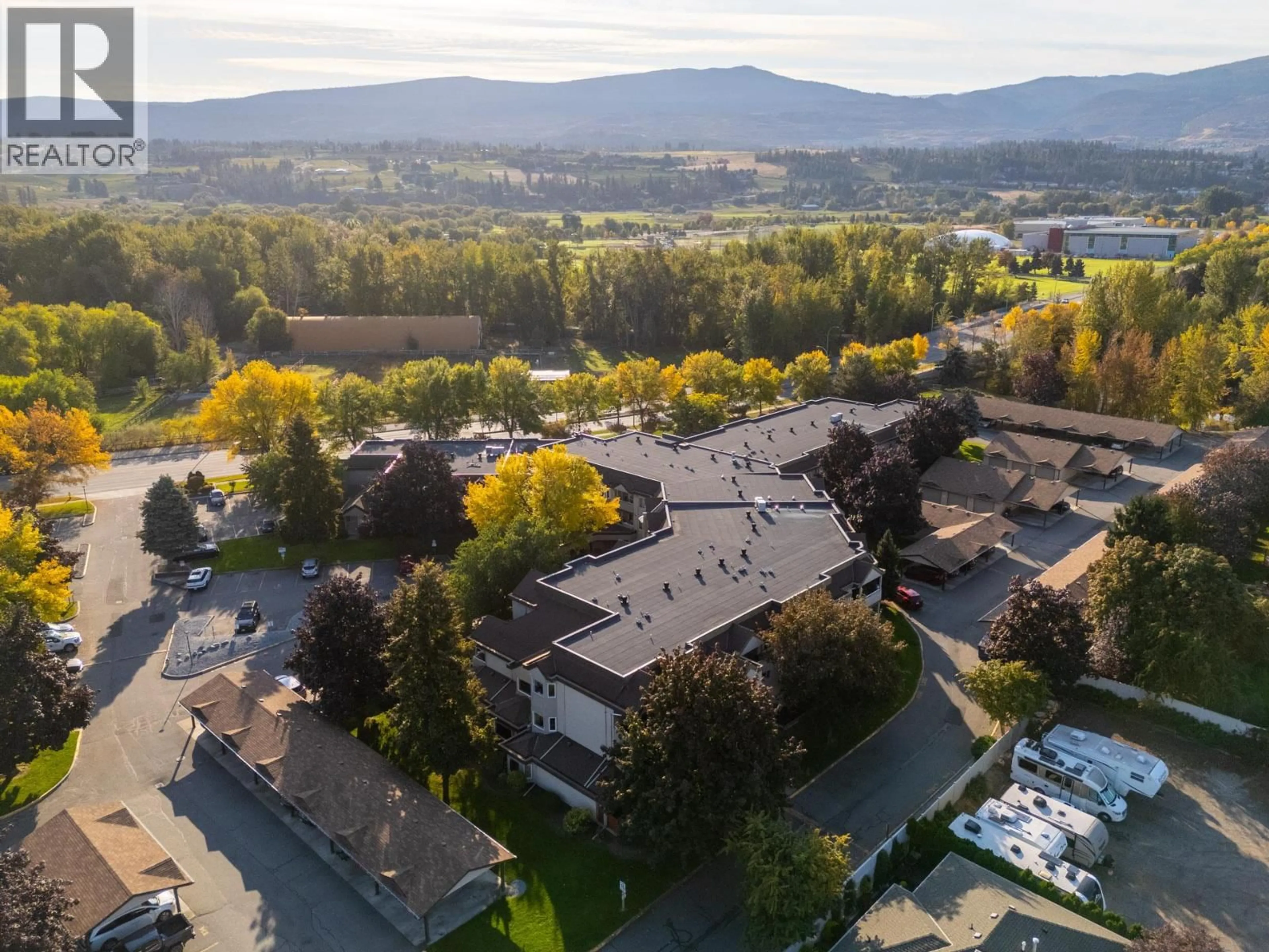 A pic from outside/outdoor area/front of a property/back of a property/a pic from drone, mountain view for 285 - 3854 GORDON DRIVE, Kelowna British Columbia V1W3G4