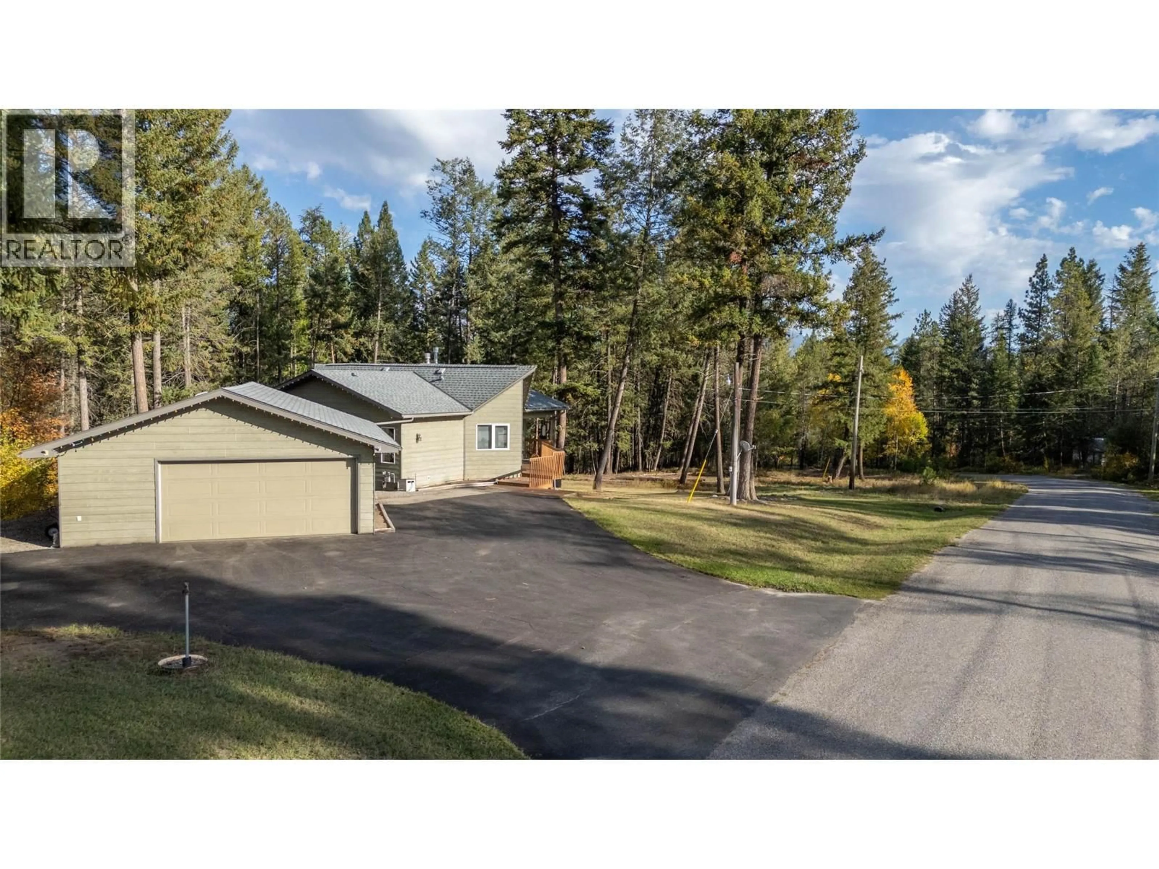 A pic from outside/outdoor area/front of a property/back of a property/a pic from drone, street for 7250 OLSEN ROAD, Jaffray British Columbia V0B1T0
