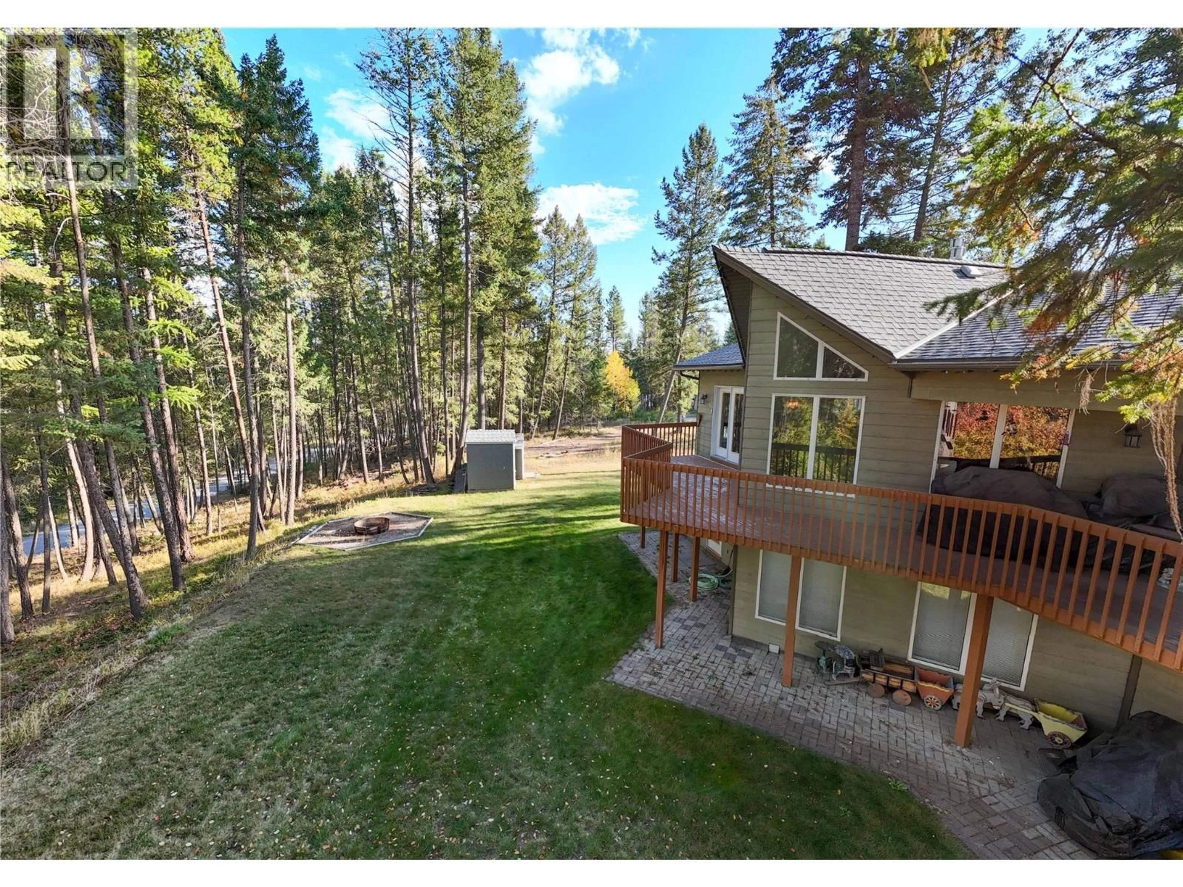 A pic from outside/outdoor area/front of a property/back of a property/a pic from drone, forest/trees view for 7250 OLSEN ROAD, Jaffray British Columbia V0B1T0