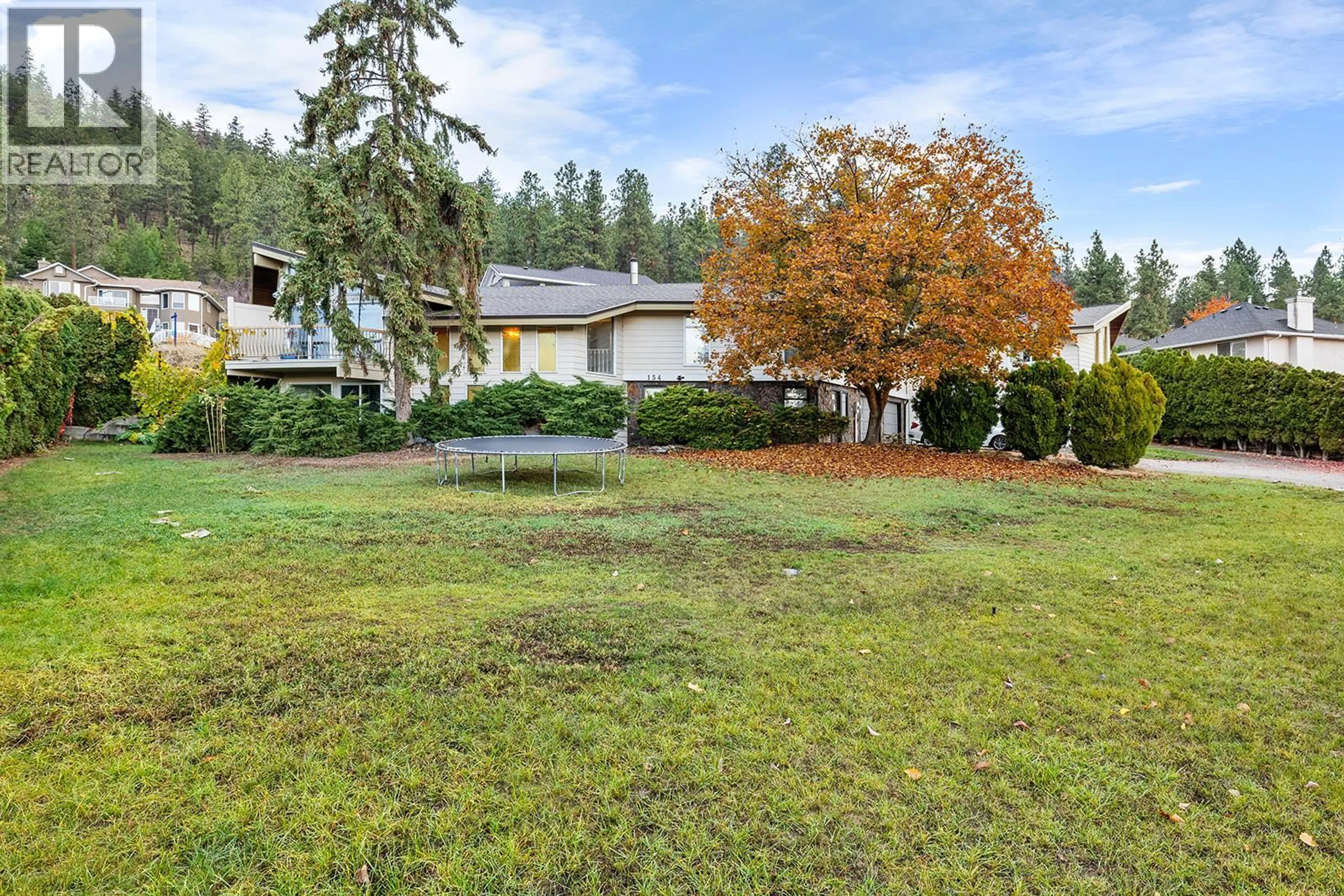 A pic from outside/outdoor area/front of a property/back of a property/a pic from drone, unknown for 154 APPLEBROOKE CRESCENT, Kelowna British Columbia V1V1W4