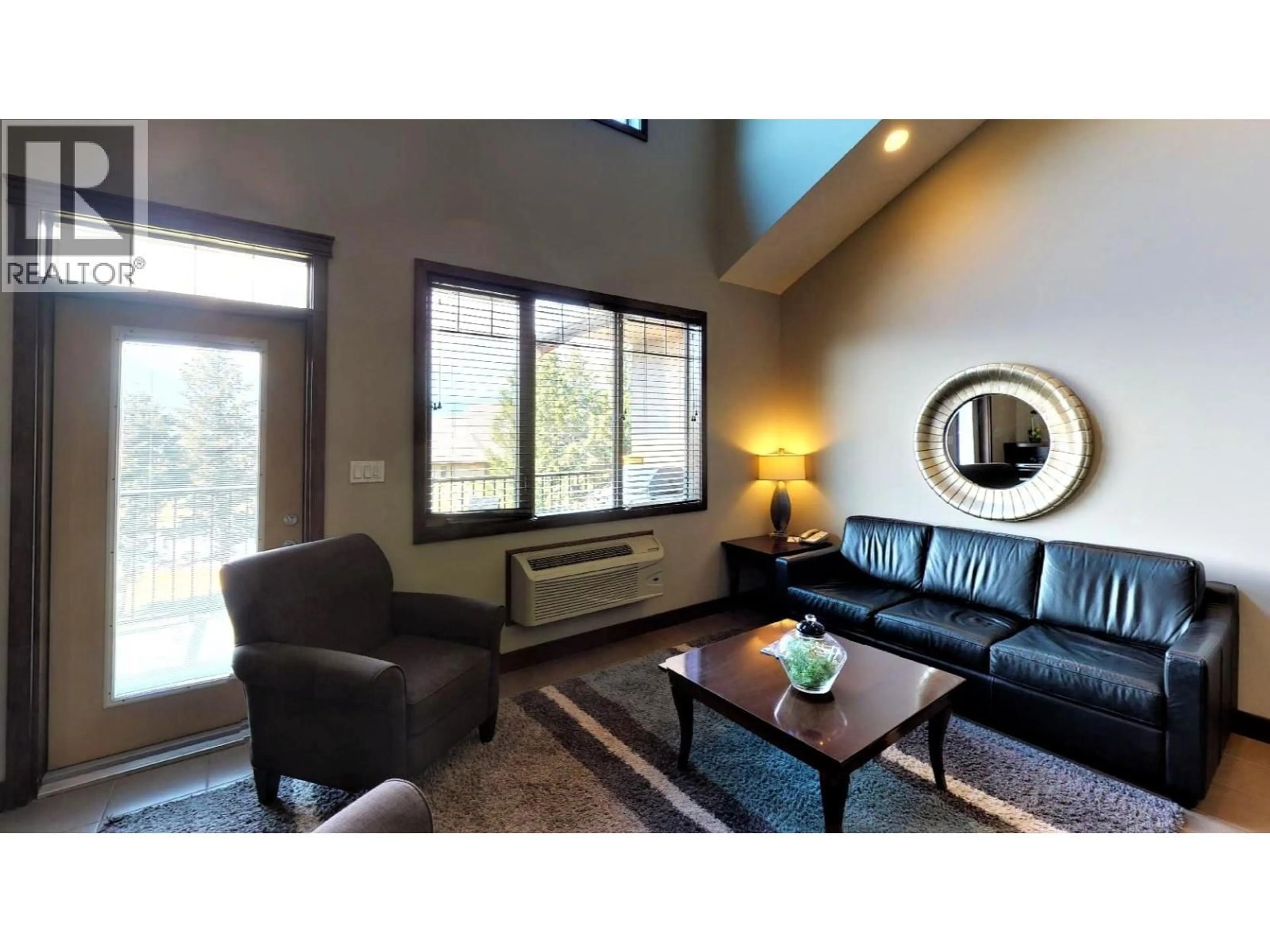Living room with furniture, wood/laminate floor for 735 E1 - 700 BIGHORN BOULEVARD, Radium Hot Springs British Columbia V0A1M0