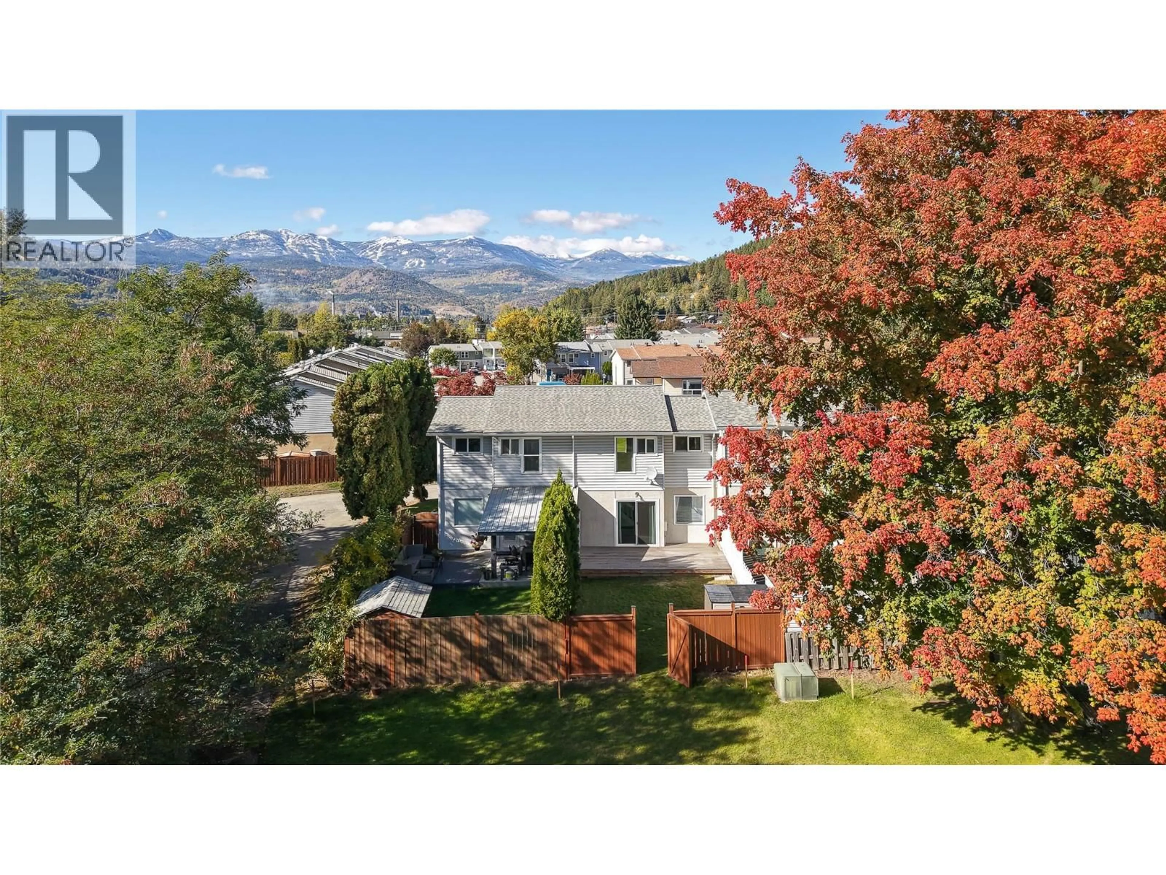 A pic from outside/outdoor area/front of a property/back of a property/a pic from drone, mountain view for 3366 LAUREL CRESCENT, Trail British Columbia V1R4M5