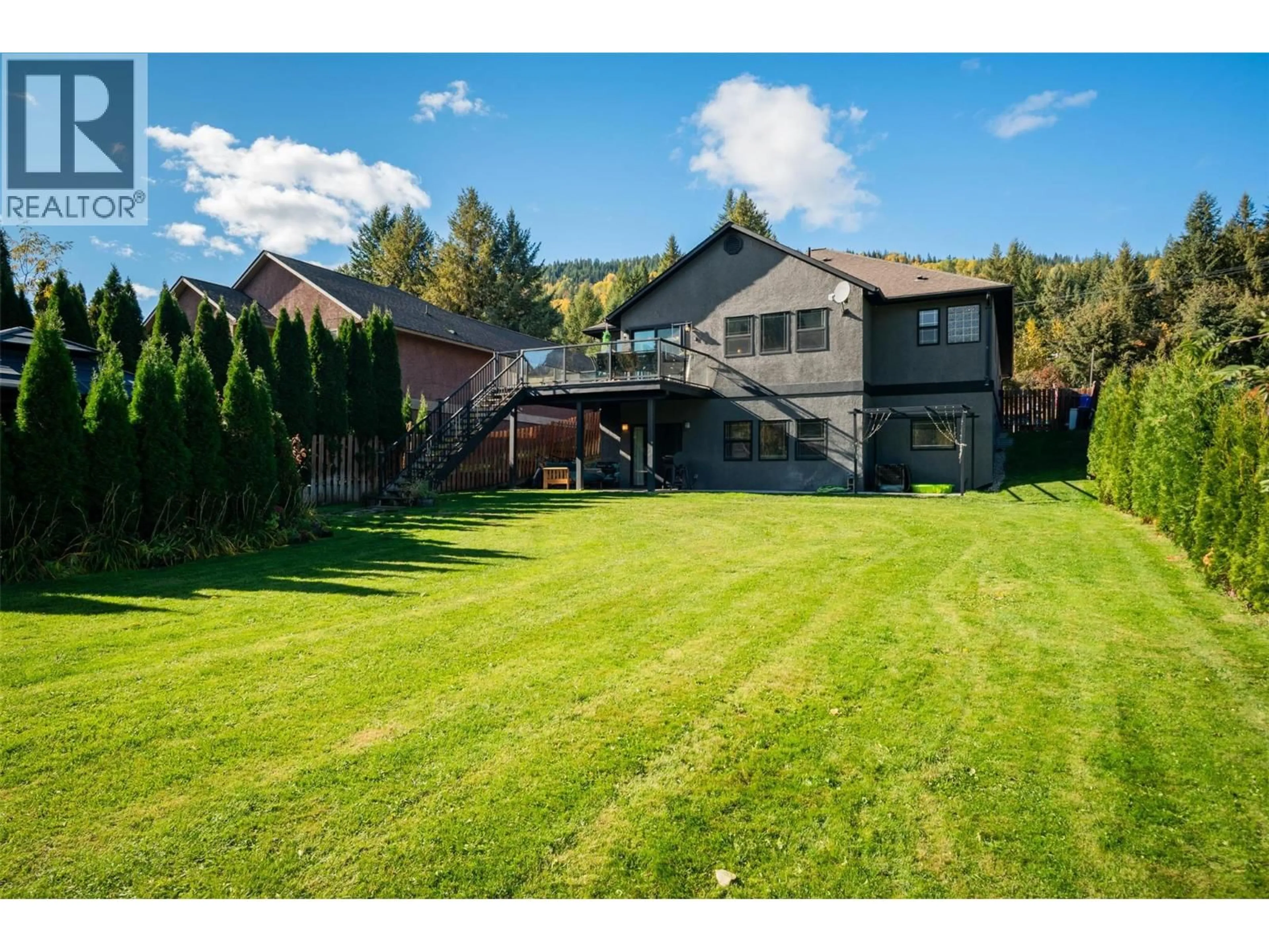 A pic from outside/outdoor area/front of a property/back of a property/a pic from drone, mountain view for 1518 3B HIGHWAY, Fruitvale British Columbia V0G1L1