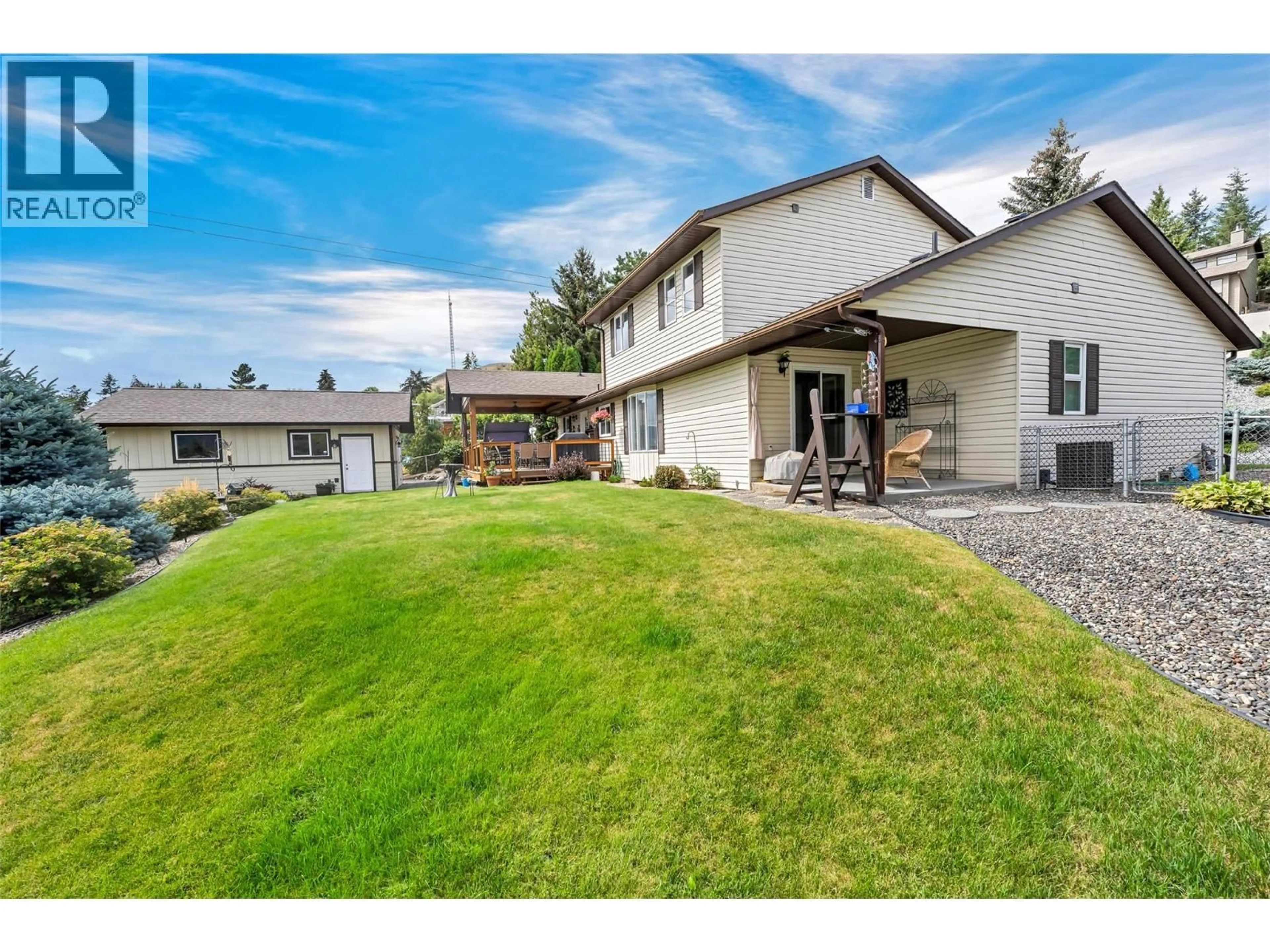 A pic from outside/outdoor area/front of a property/back of a property/a pic from drone, unknown for 6463 BLUE JAY ROAD, Vernon British Columbia V1H1W5