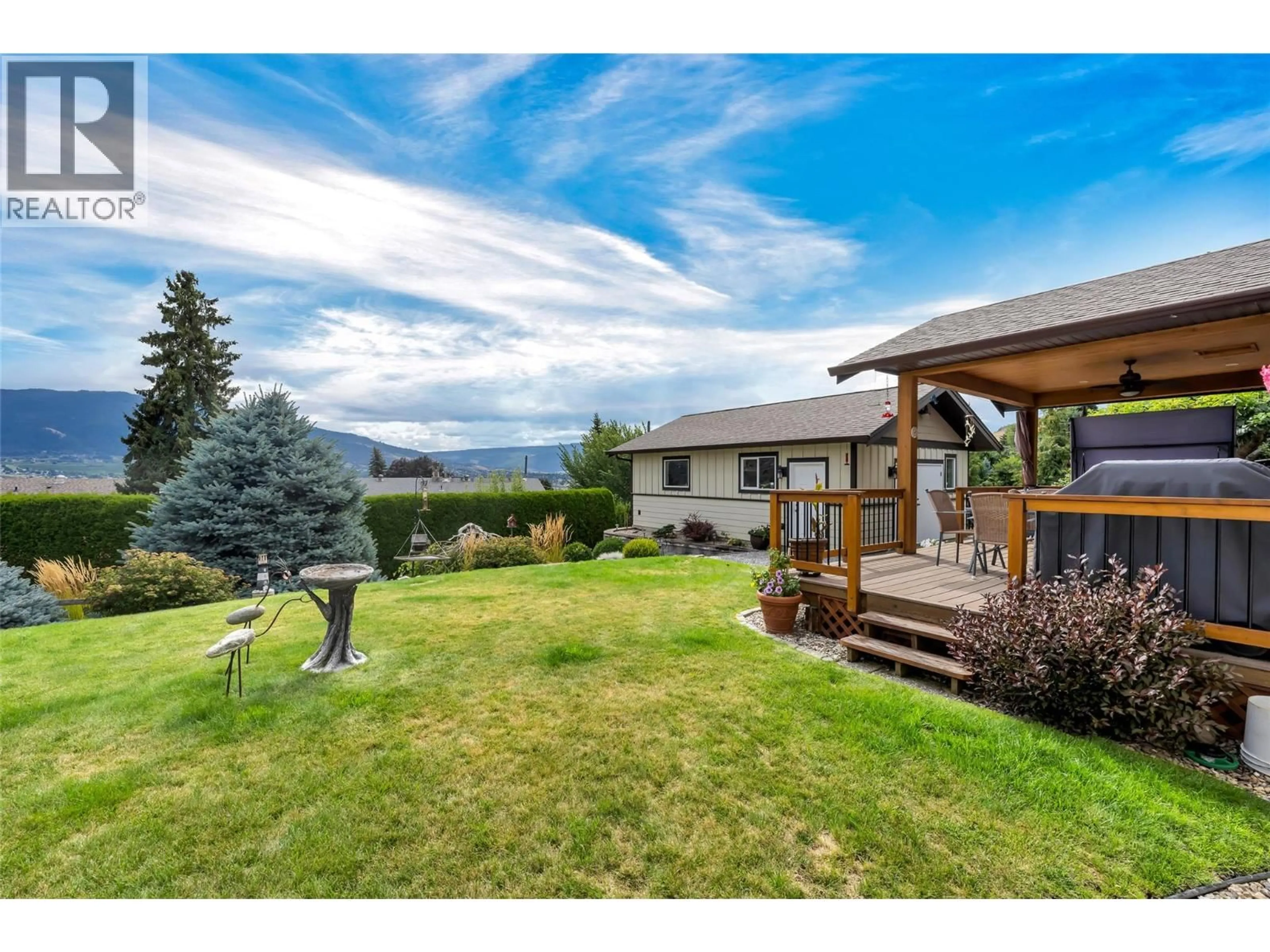 A pic from outside/outdoor area/front of a property/back of a property/a pic from drone, mountain view for 6463 BLUE JAY ROAD, Vernon British Columbia V1H1W5