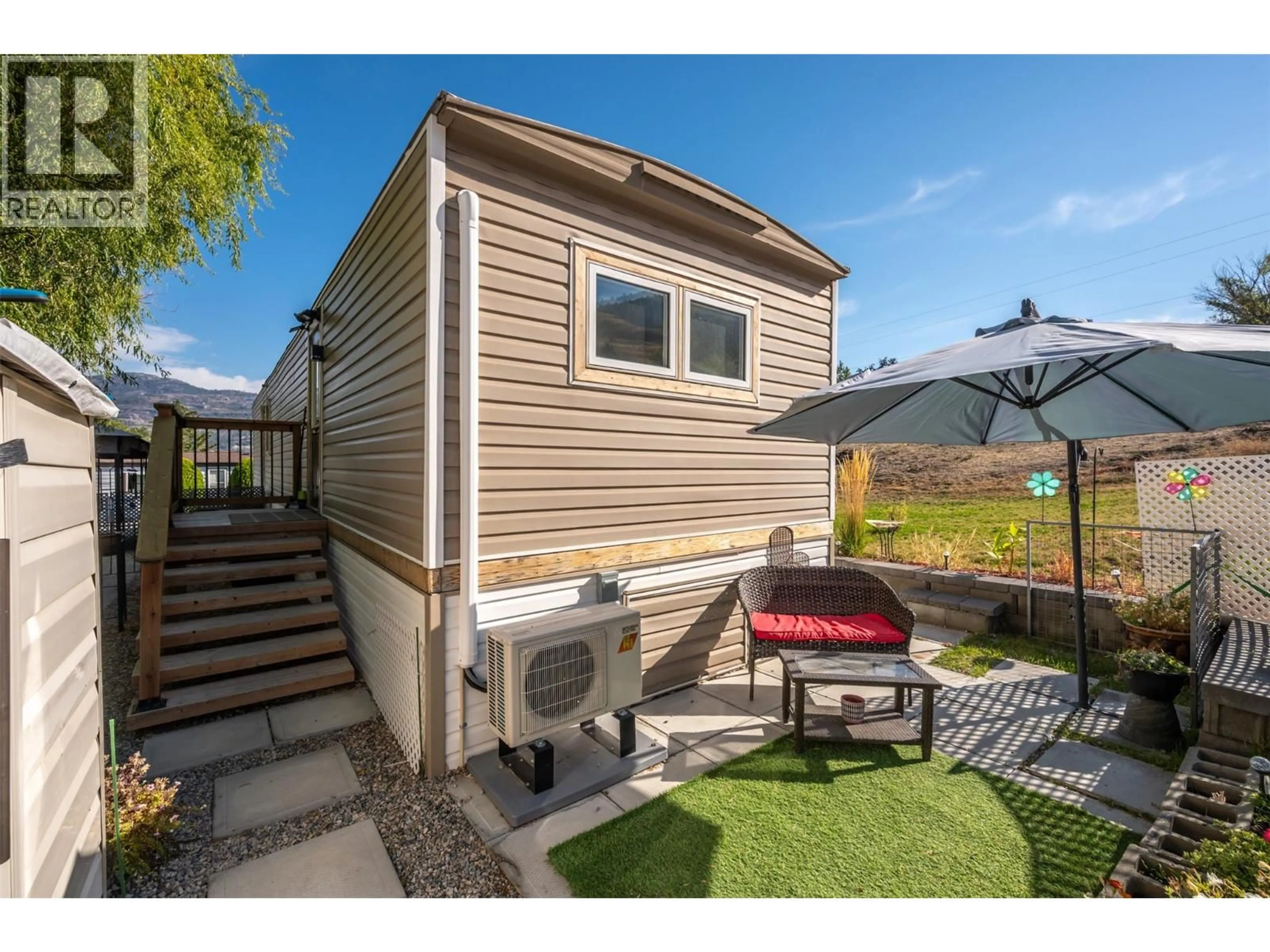 Home with vinyl exterior material, street for 23 - 201 RIVA RIDGE EST OTHER, Penticton British Columbia V2A6J7