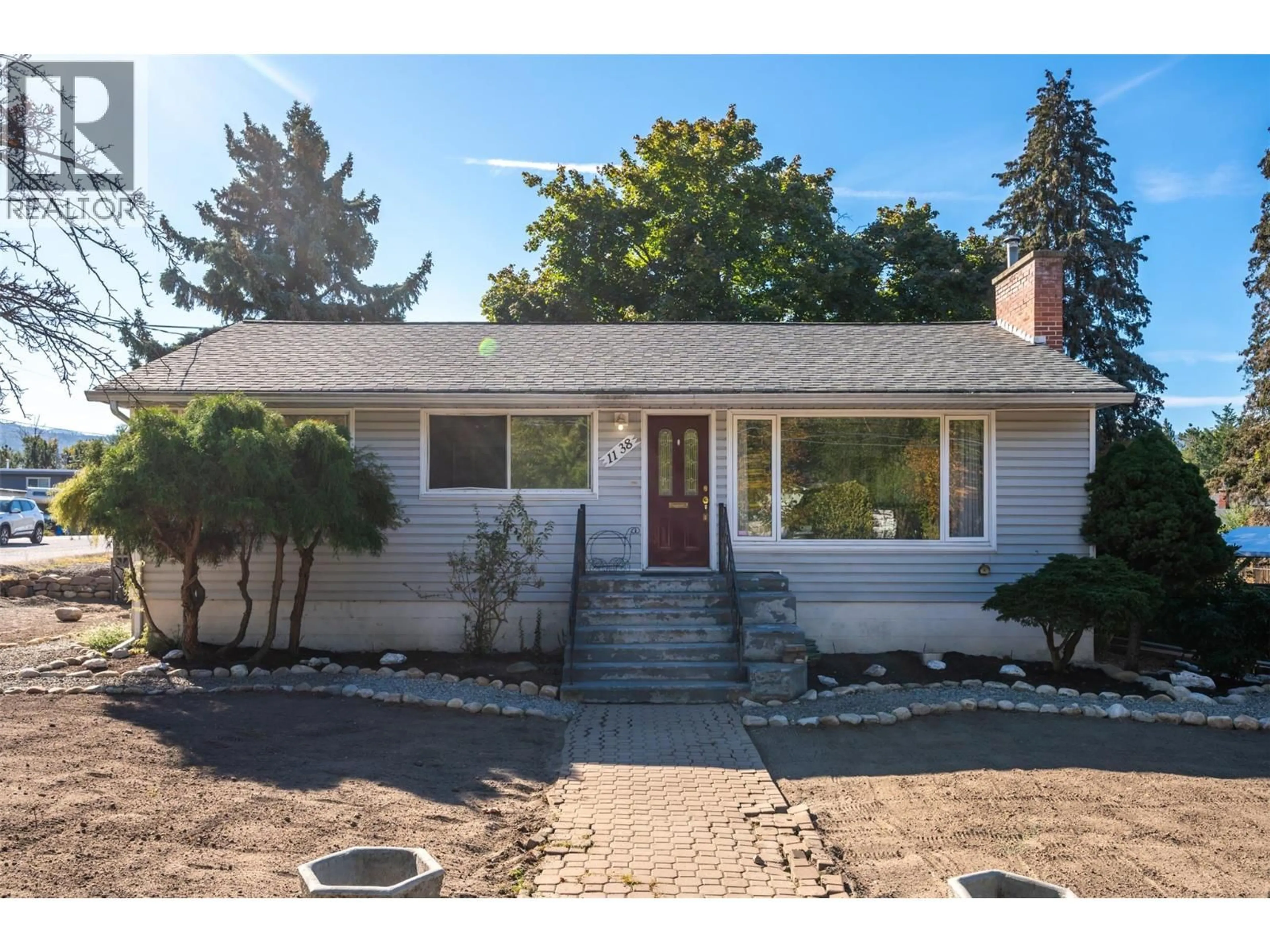 Home with vinyl exterior material, street for 1138 FORESTBROOK DRIVE, Penticton British Columbia V2A2G5