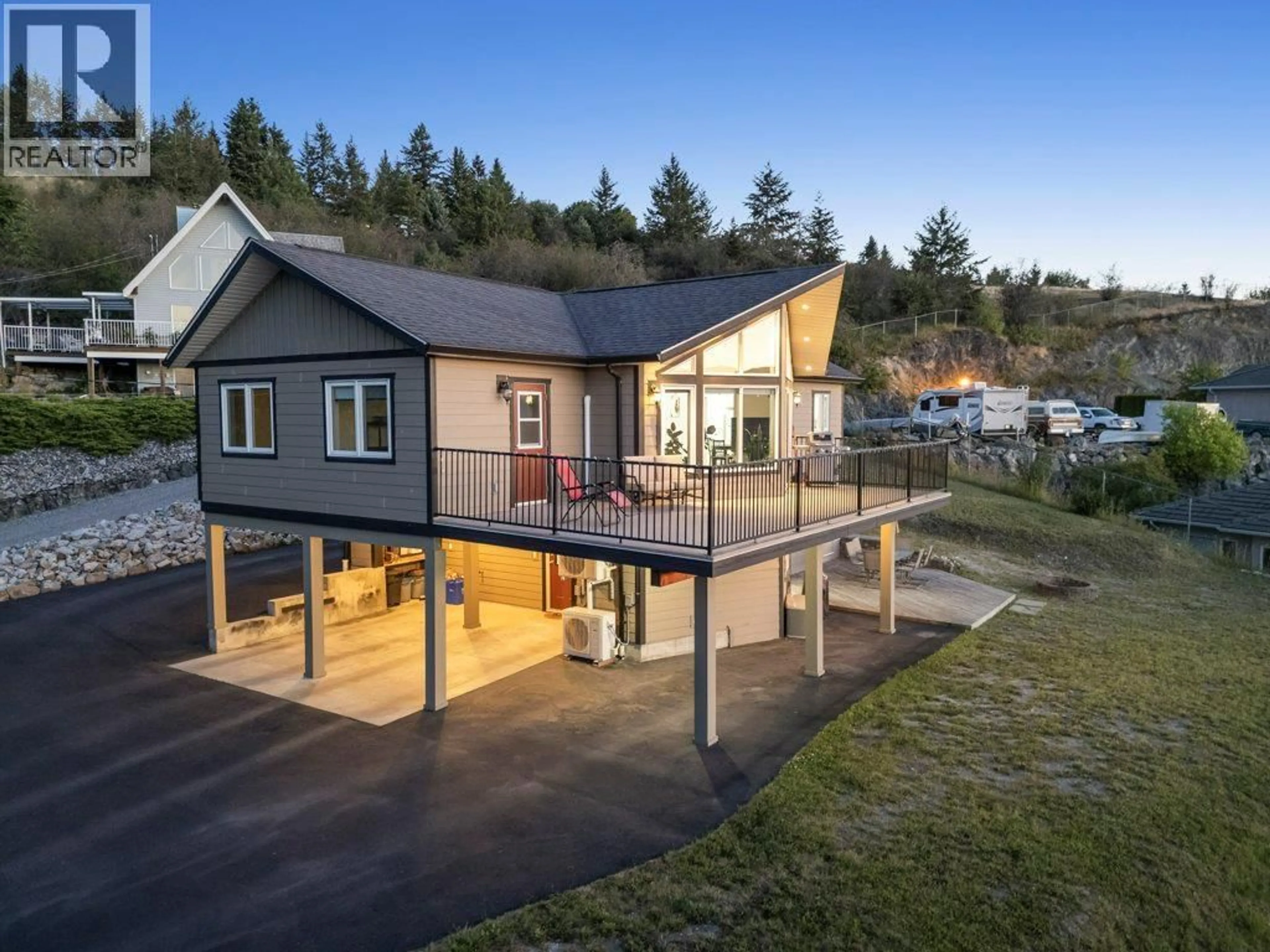 A pic from outside/outdoor area/front of a property/back of a property/a pic from drone, unknown for 148 FENWICK ROAD, Vernon British Columbia V1B2V6