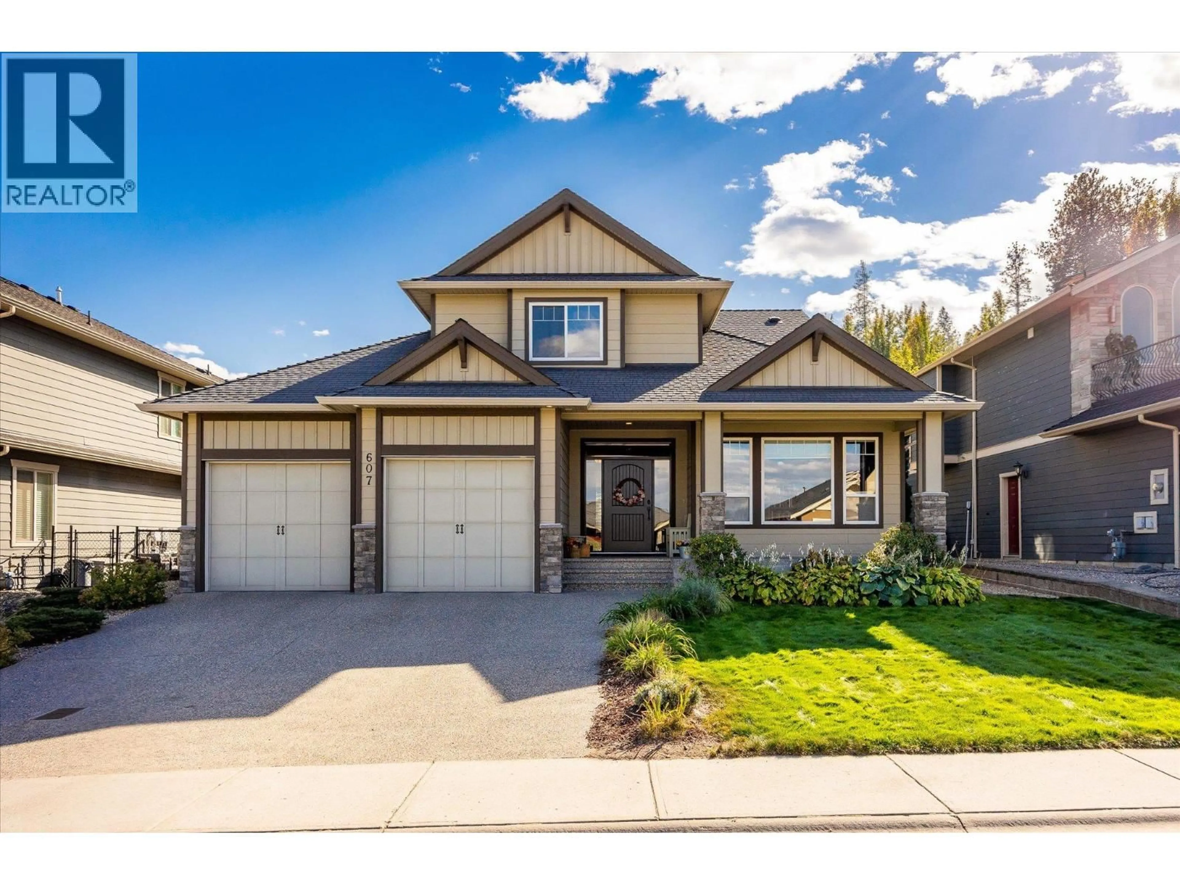 Home with vinyl exterior material, street for 607 QUARRY AVENUE, Kelowna British Columbia V1W5B3
