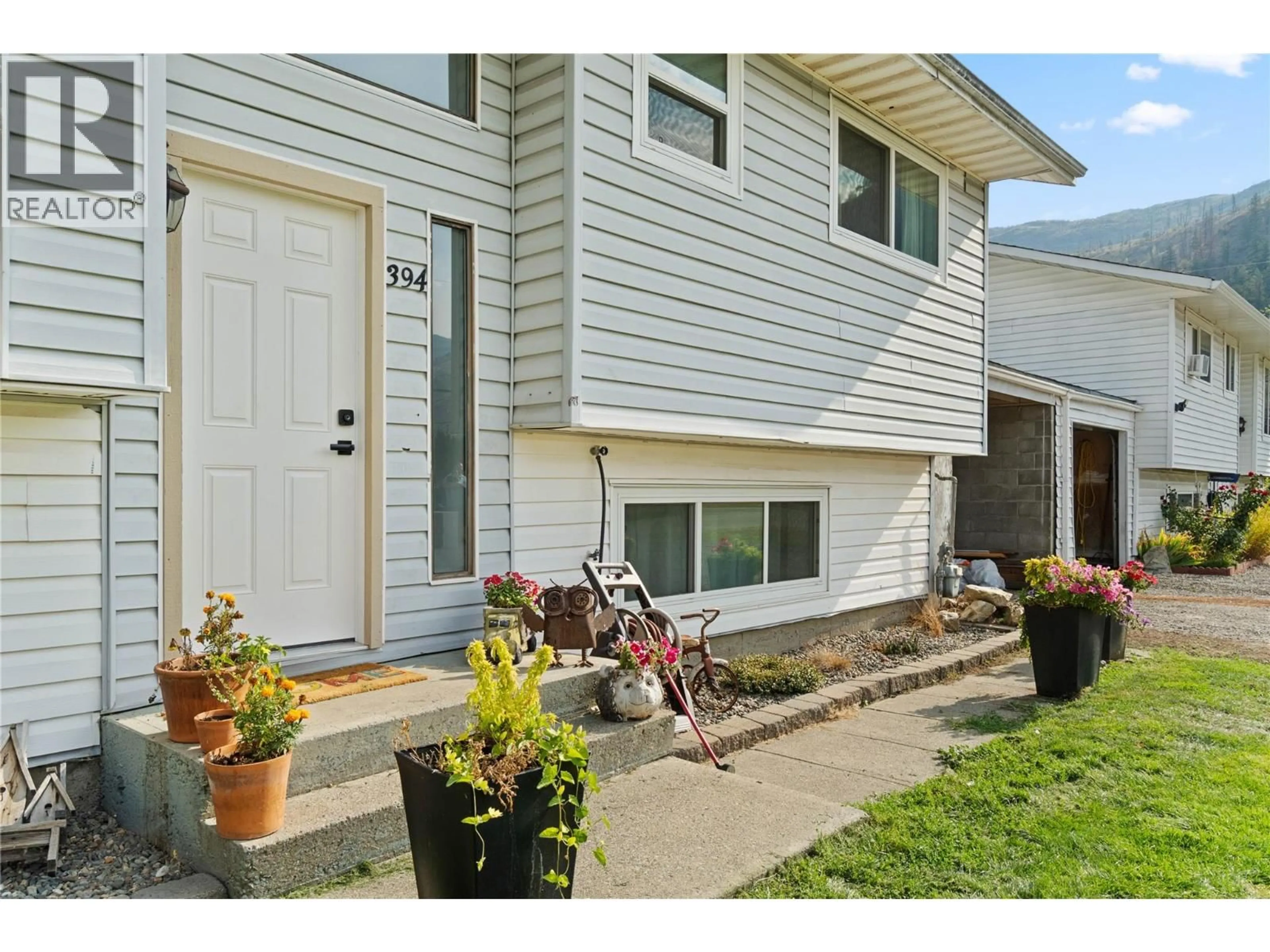 Home with vinyl exterior material, street for 394 REIGHMOUNT DRIVE, Kamloops British Columbia V2H1M2