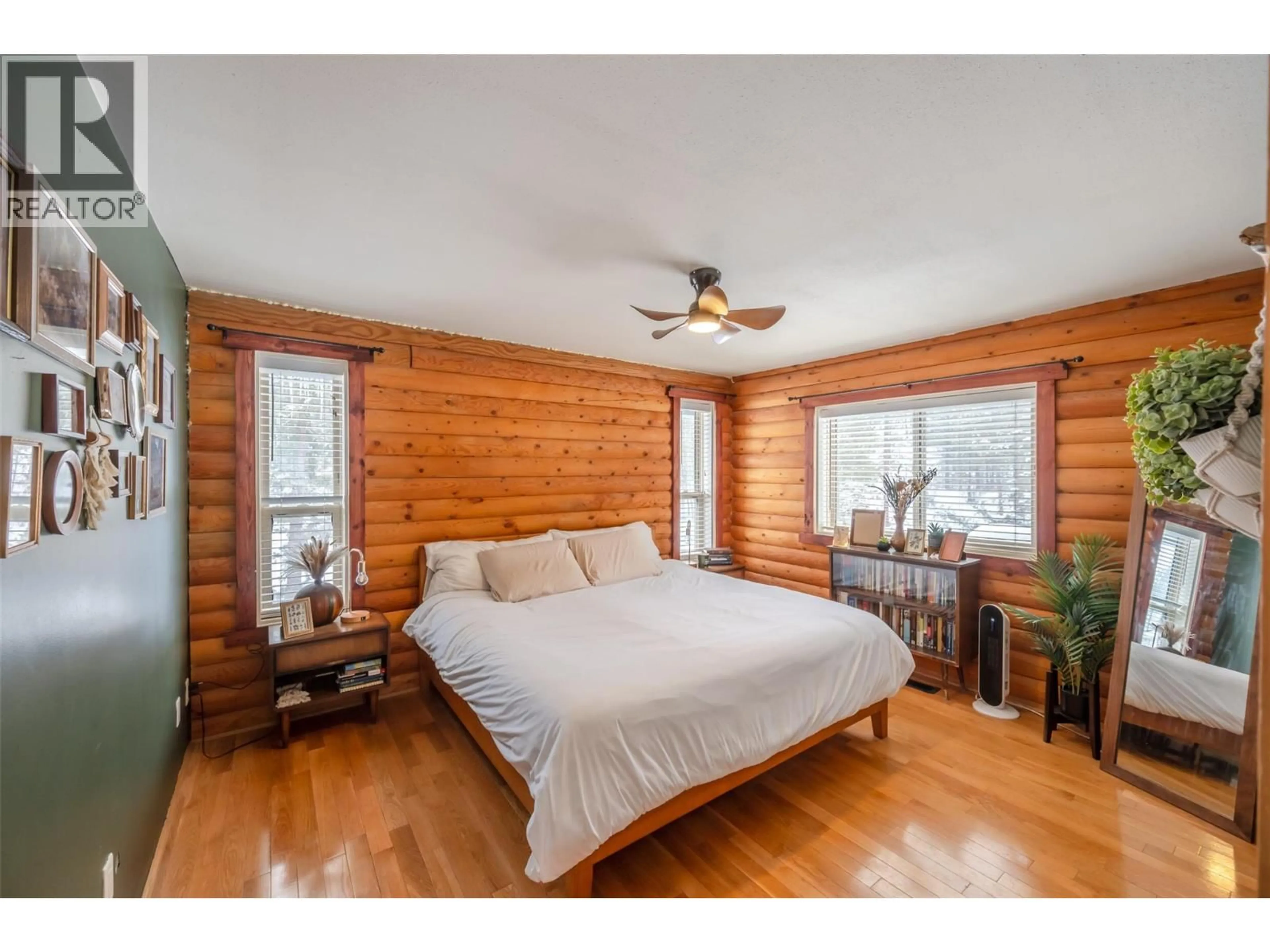 Bedroom with bed, wood/laminate floor for 105 SADDLEHORN DRIVE, Kaleden British Columbia V0H1K0