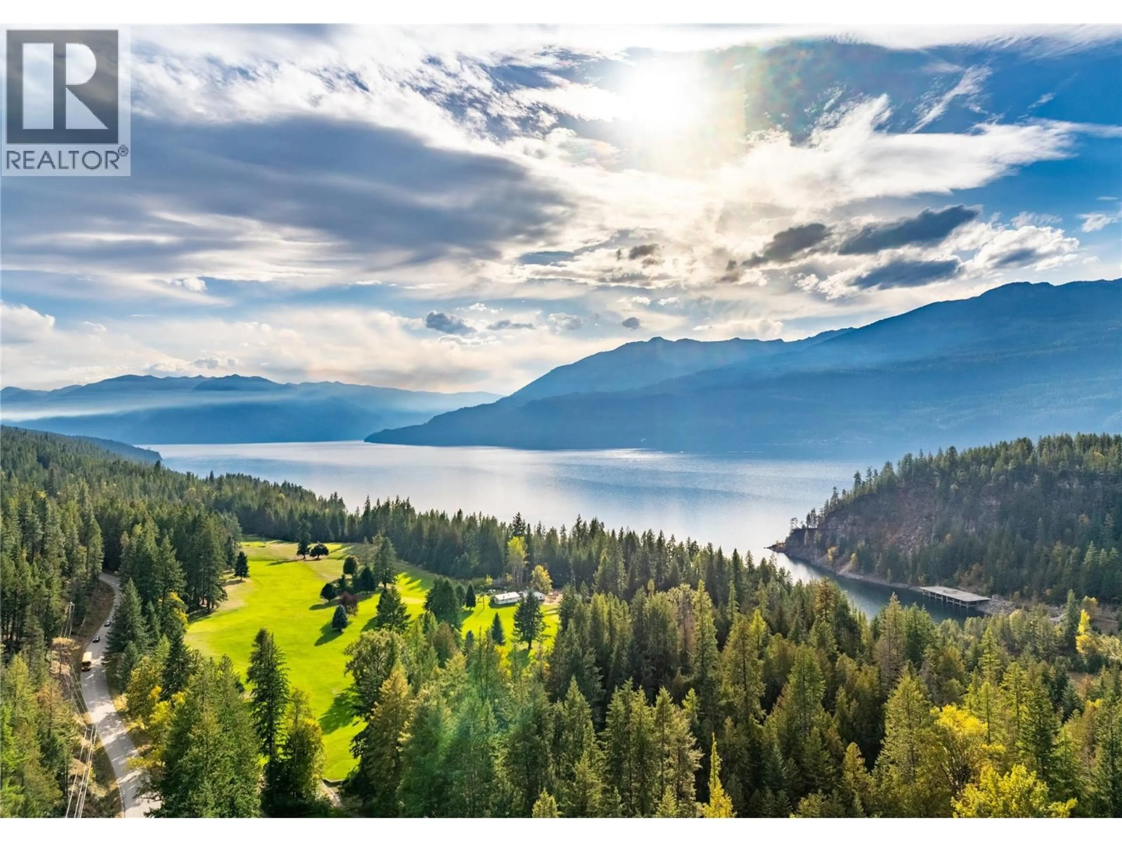 A pic from outside/outdoor area/front of a property/back of a property/a pic from drone, water/lake/river/ocean view for 1529 RUSSEL AVENUE, Riondel British Columbia V0B2B0