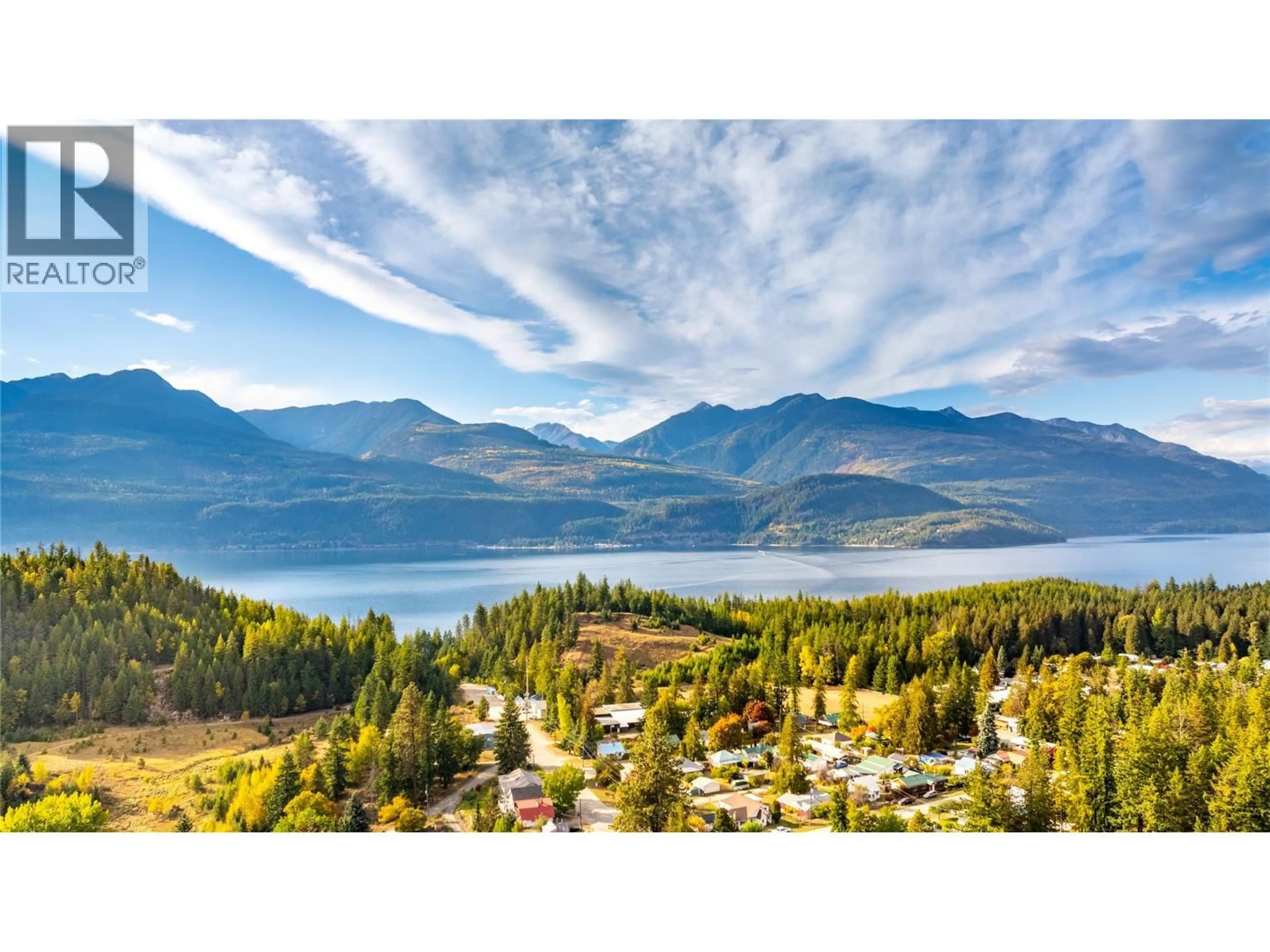 A pic from outside/outdoor area/front of a property/back of a property/a pic from drone, water/lake/river/ocean view for 1529 RUSSEL AVENUE, Riondel British Columbia V0B2B0