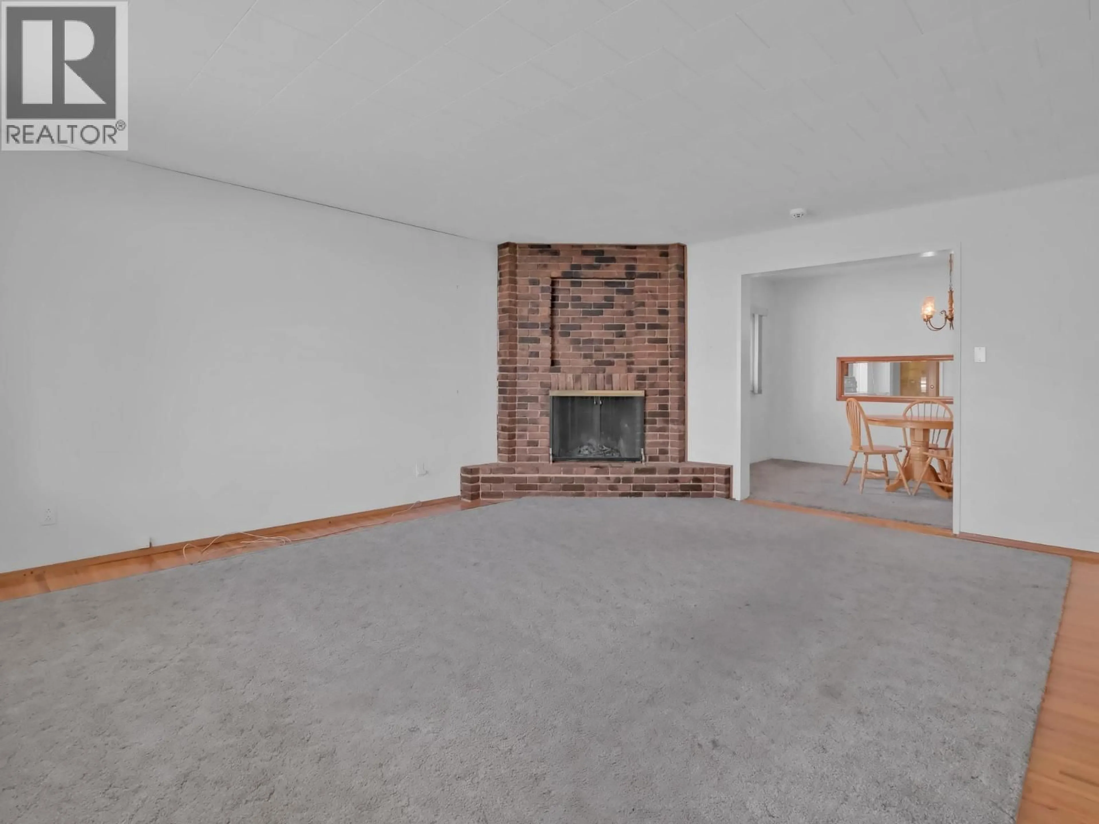 Living room with furniture, unknown for 312 SCOTT AVENUE, Penticton British Columbia V2A2J8