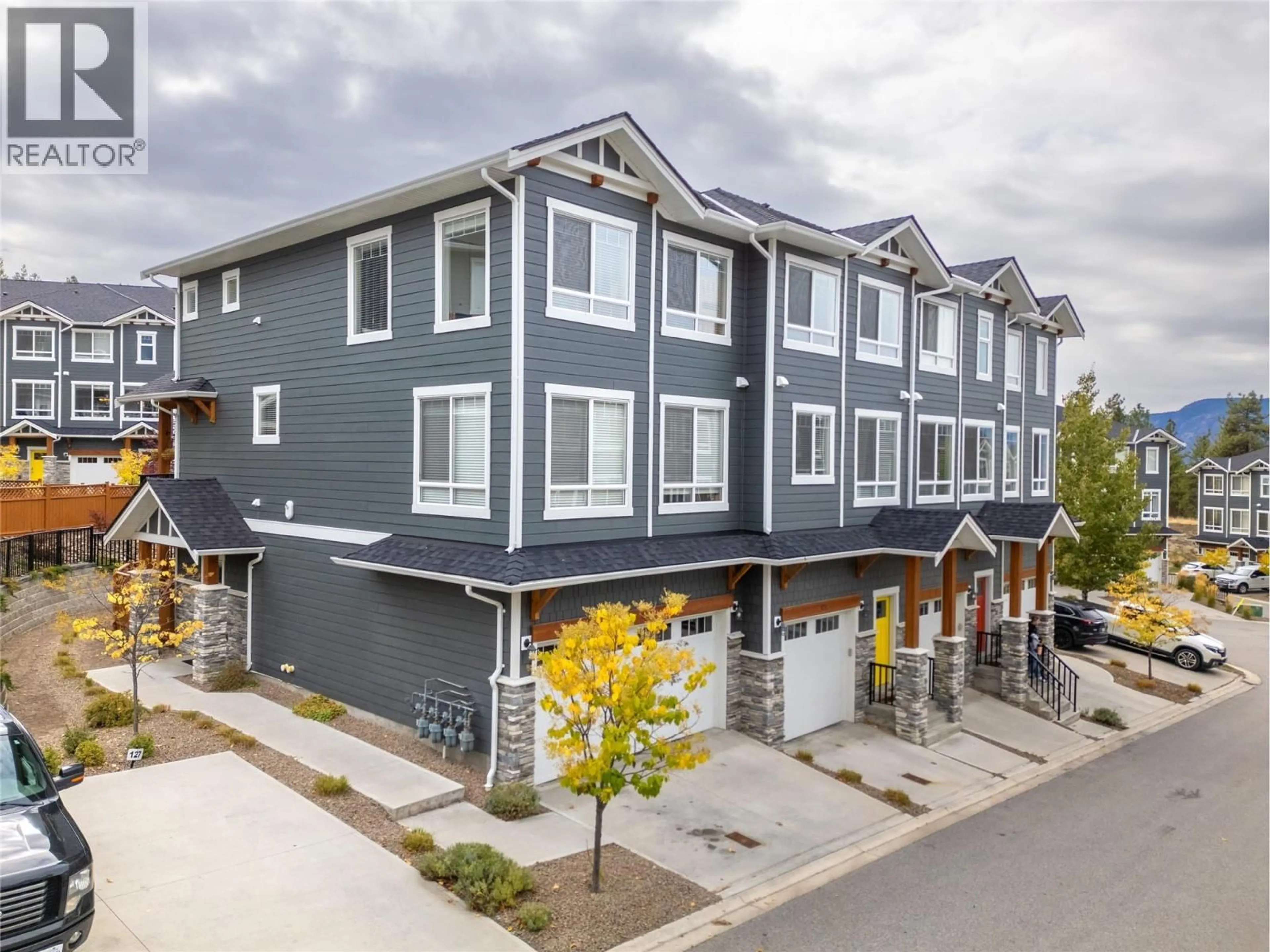 A pic from outside/outdoor area/front of a property/back of a property/a pic from drone, street for 128 - 1115 HOLDEN ROAD, Penticton British Columbia V2A0B7