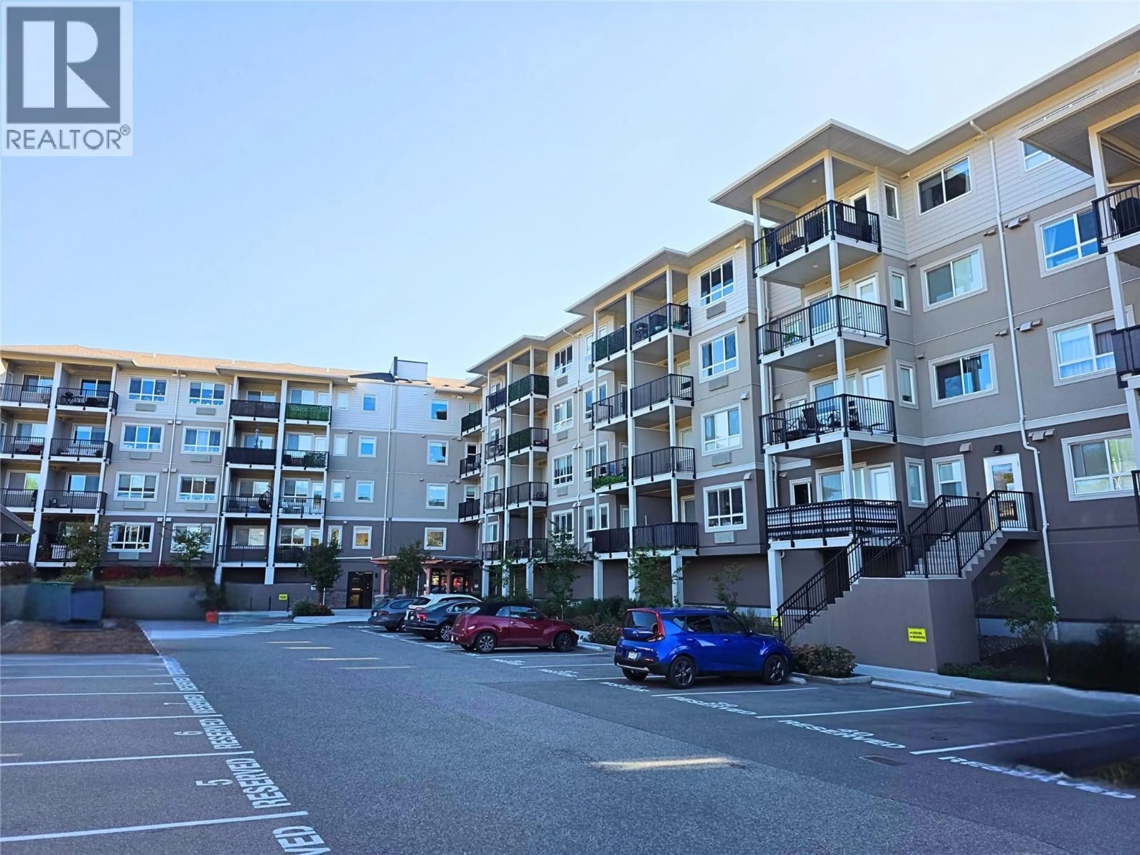 A pic from outside/outdoor area/front of a property/back of a property/a pic from drone, street for 420 - 2301 CARRINGTON ROAD, West Kelowna British Columbia V4T1R8