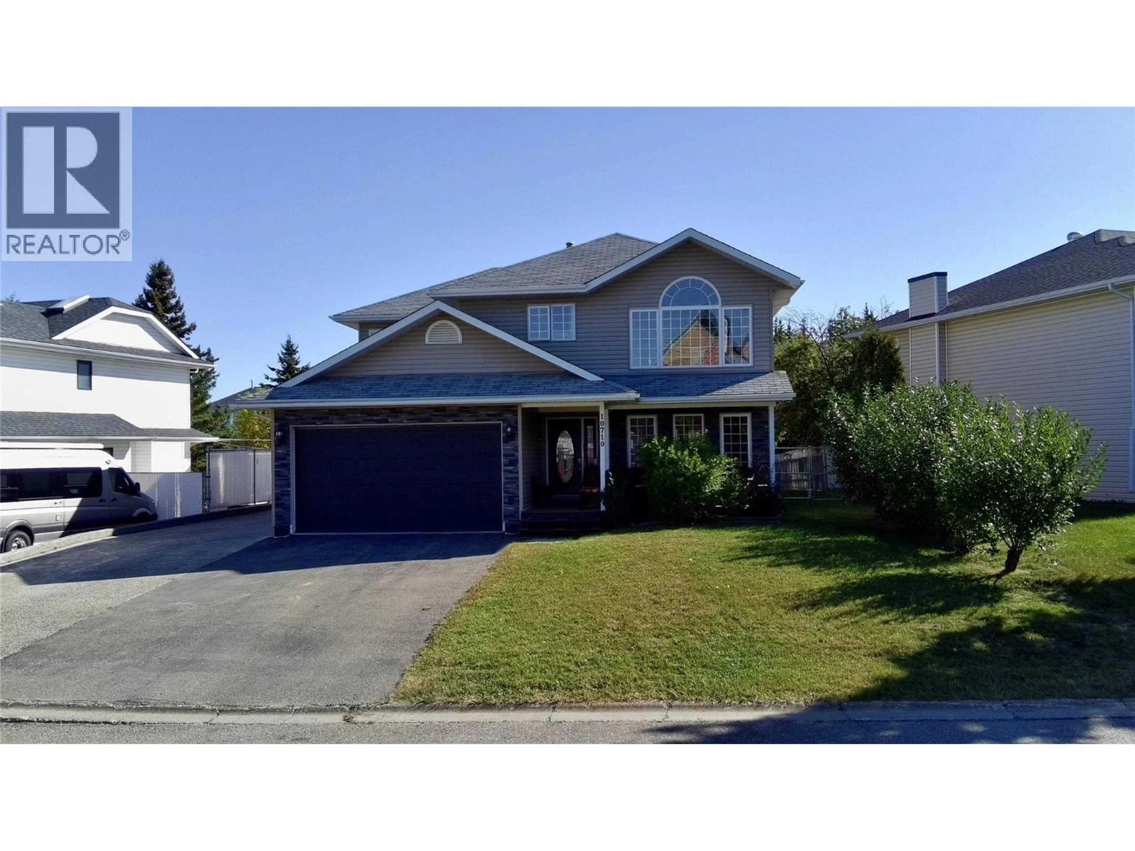 Home with vinyl exterior material, street for 10710 COTTONWOOD CRESCENT, Dawson Creek British Columbia V1G4M4
