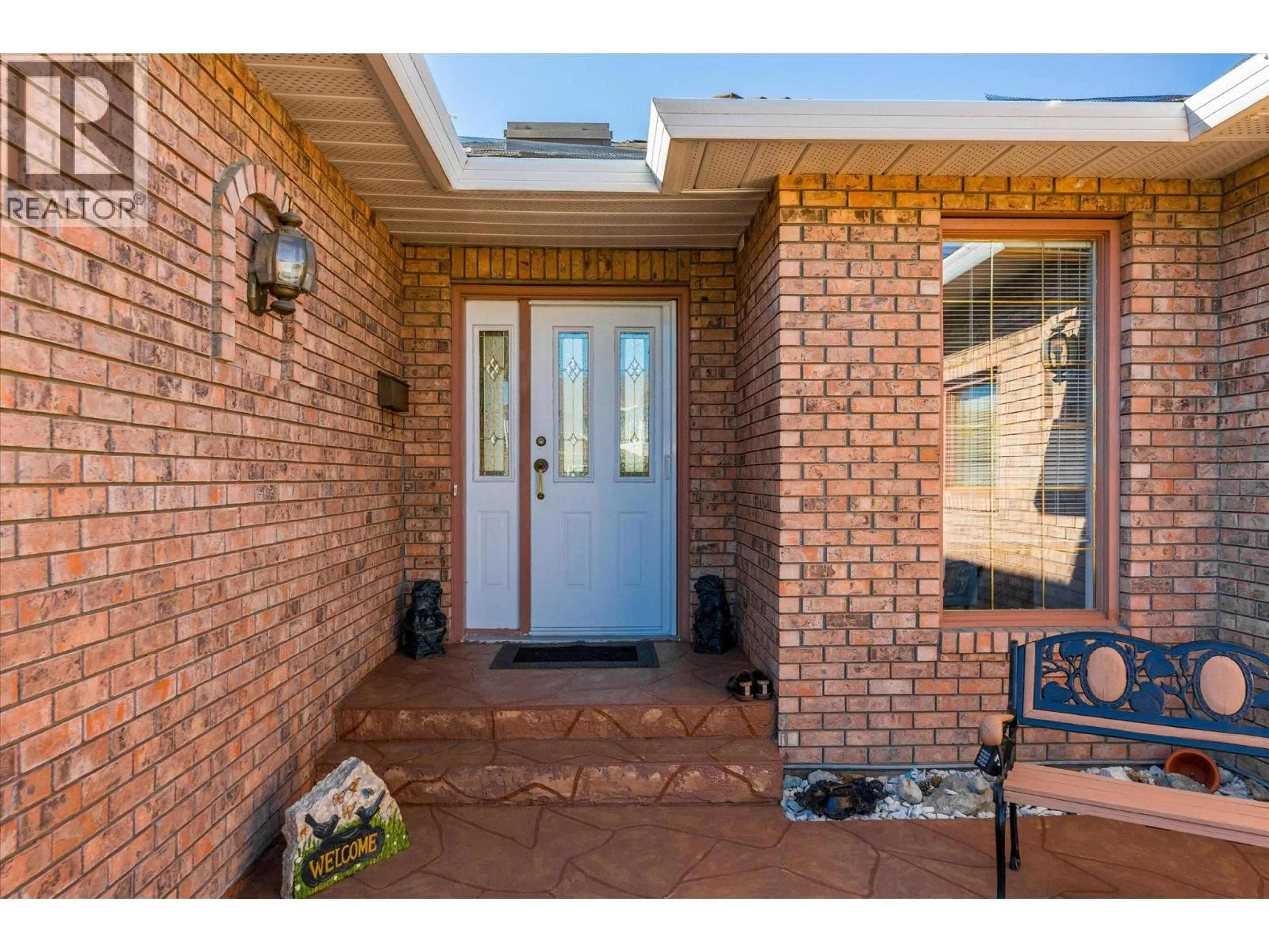 Home with brick exterior material, street for 2166 KASLO COURT, Kelowna British Columbia V1Y8C1