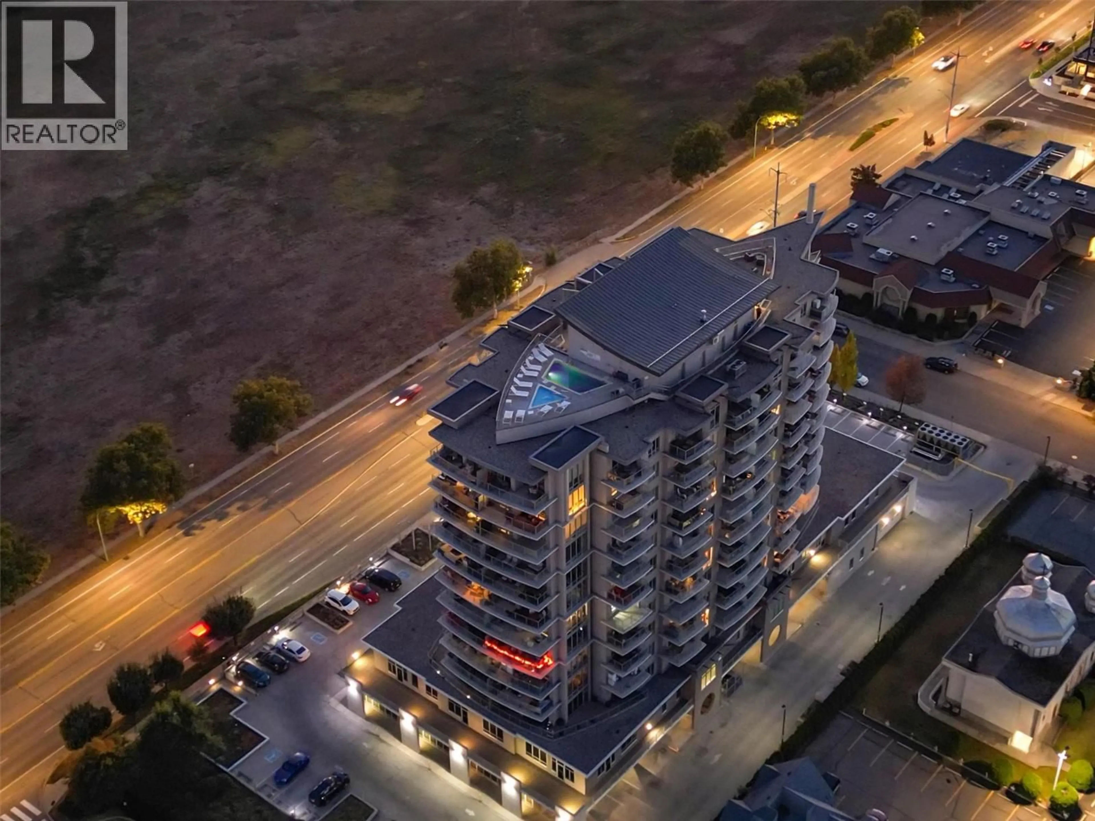 A pic from outside/outdoor area/front of a property/back of a property/a pic from drone, building for 307 - 2040 SPRINGFIELD ROAD, Kelowna British Columbia V1Y9N7