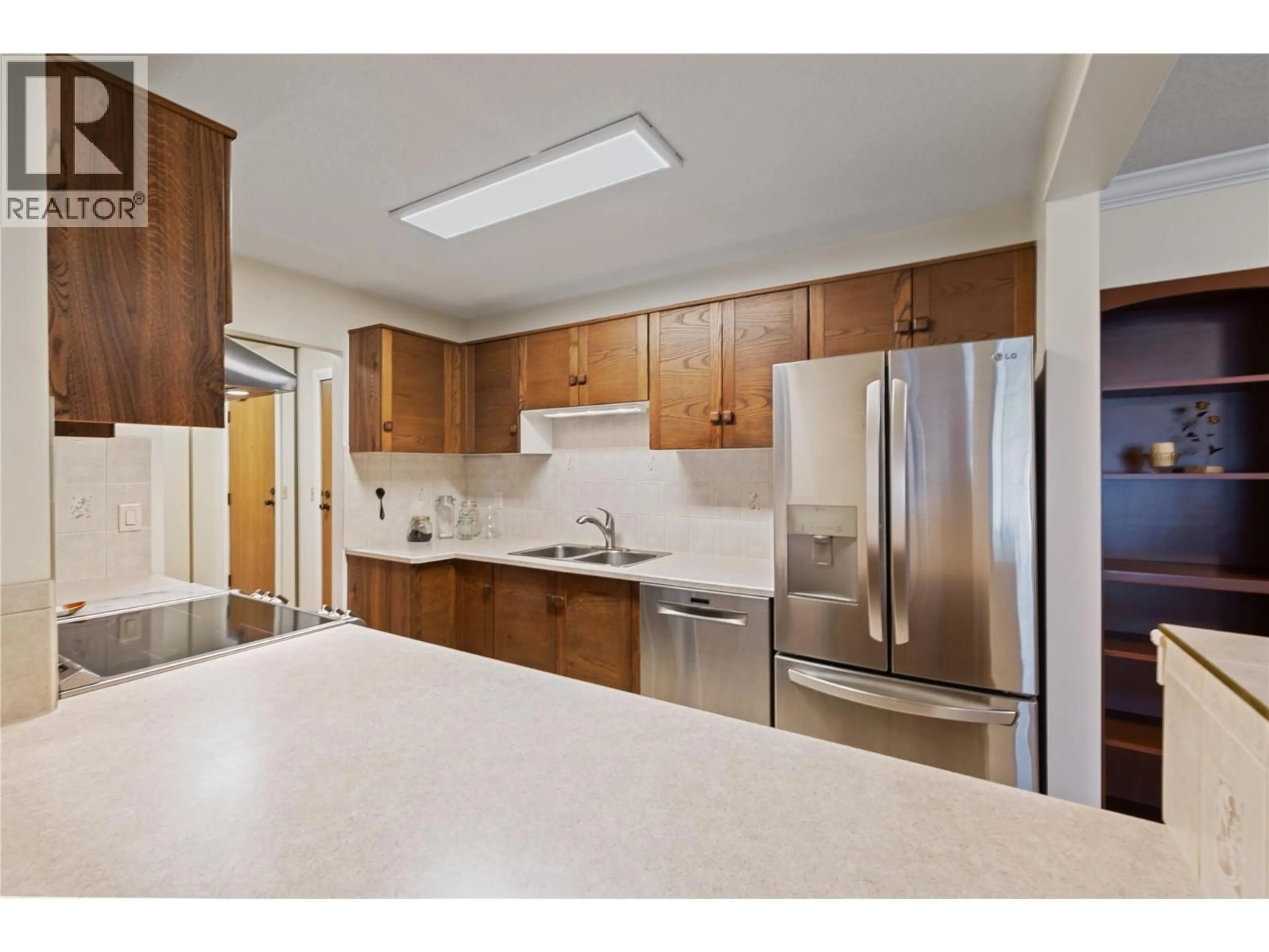 Standard kitchen, unknown for 104 - 1035 BERNARD AVENUE, Kelowna British Columbia V1Y6P7