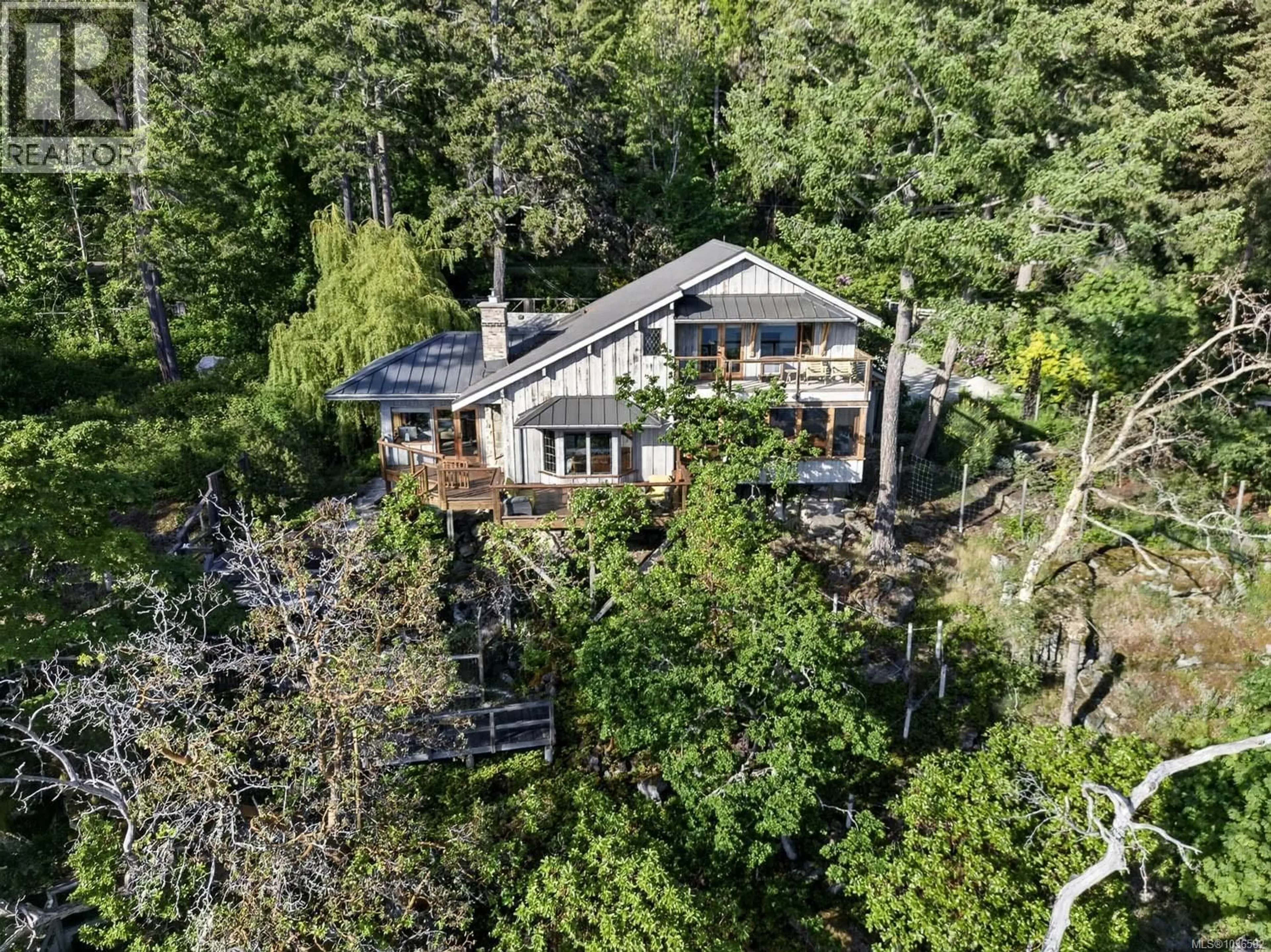 A pic from outside/outdoor area/front of a property/back of a property/a pic from drone, forest/trees view for 245 MOUNTAIN PARK DRIVE, Salt Spring British Columbia V8K1G3
