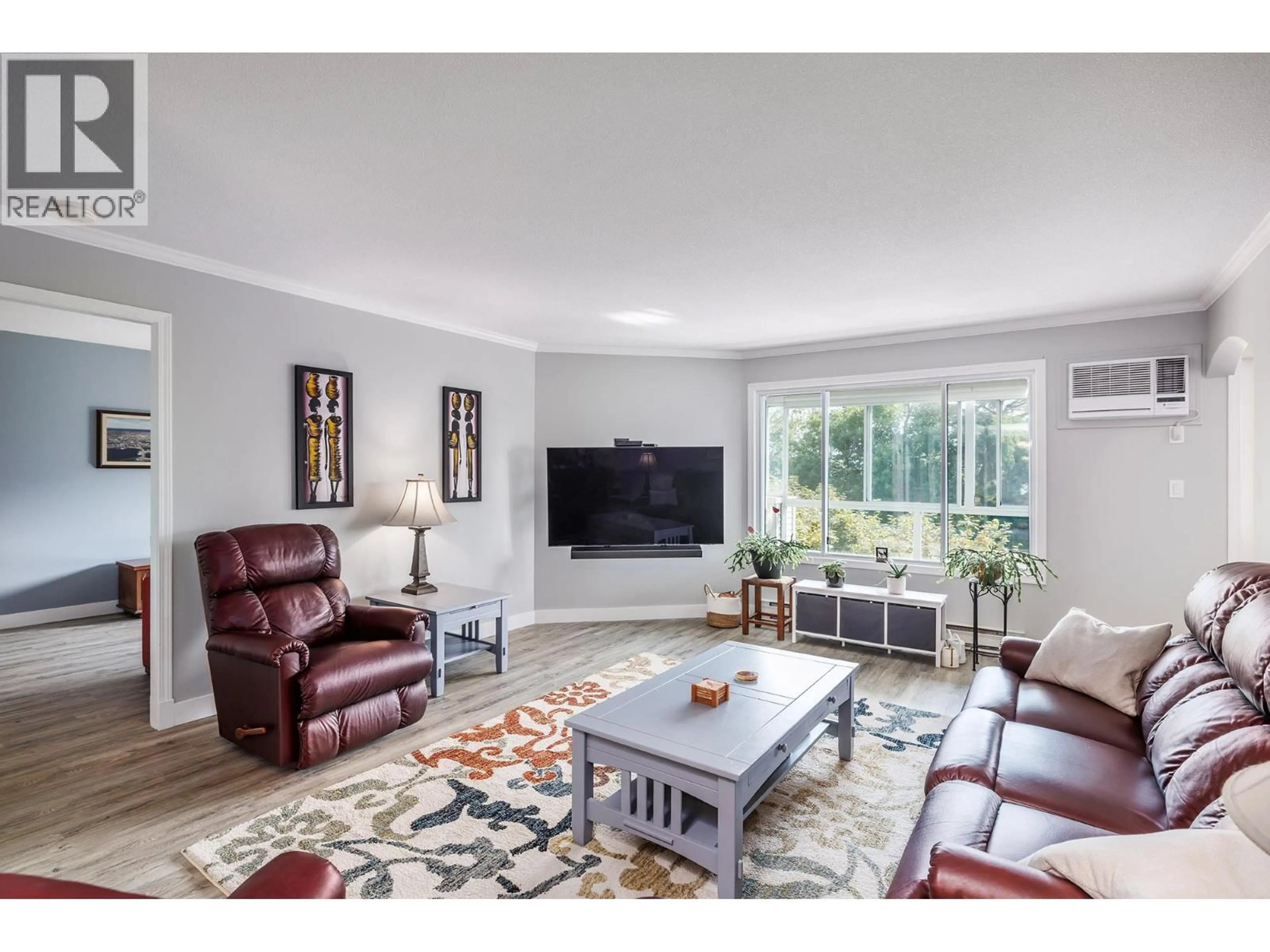 Living room with furniture, unknown for 308 - 920 GLENWOOD AVENUE, Kelowna British Columbia V1Y9P2