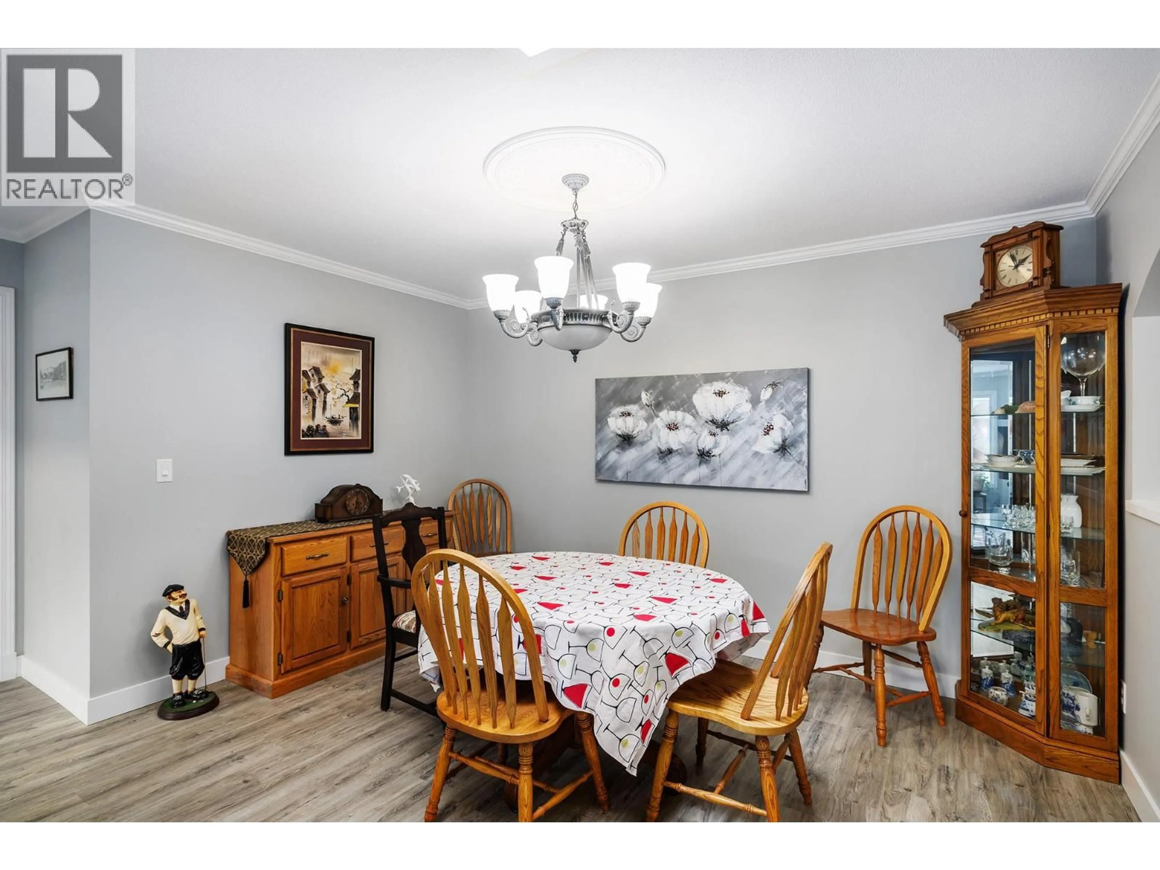 Dining room, wood/laminate floor for 308 - 920 GLENWOOD AVENUE, Kelowna British Columbia V1Y9P2