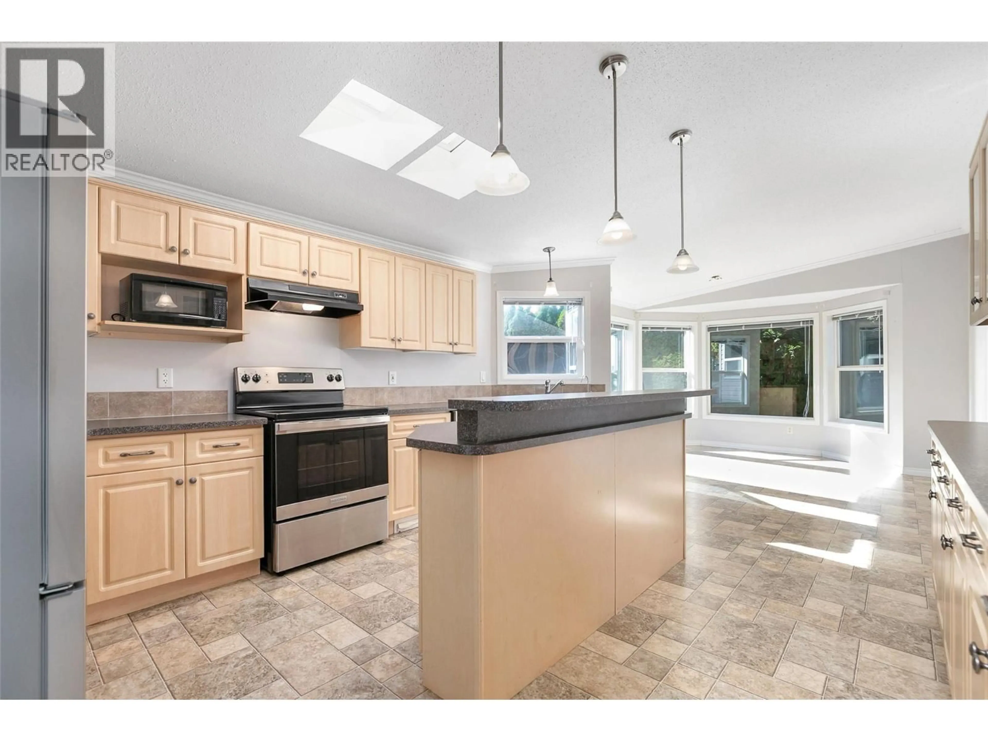 Open concept kitchen, ceramic/tile floor for 53 - 610 KATHERINE ROAD, Kelowna British Columbia V1Z3G2