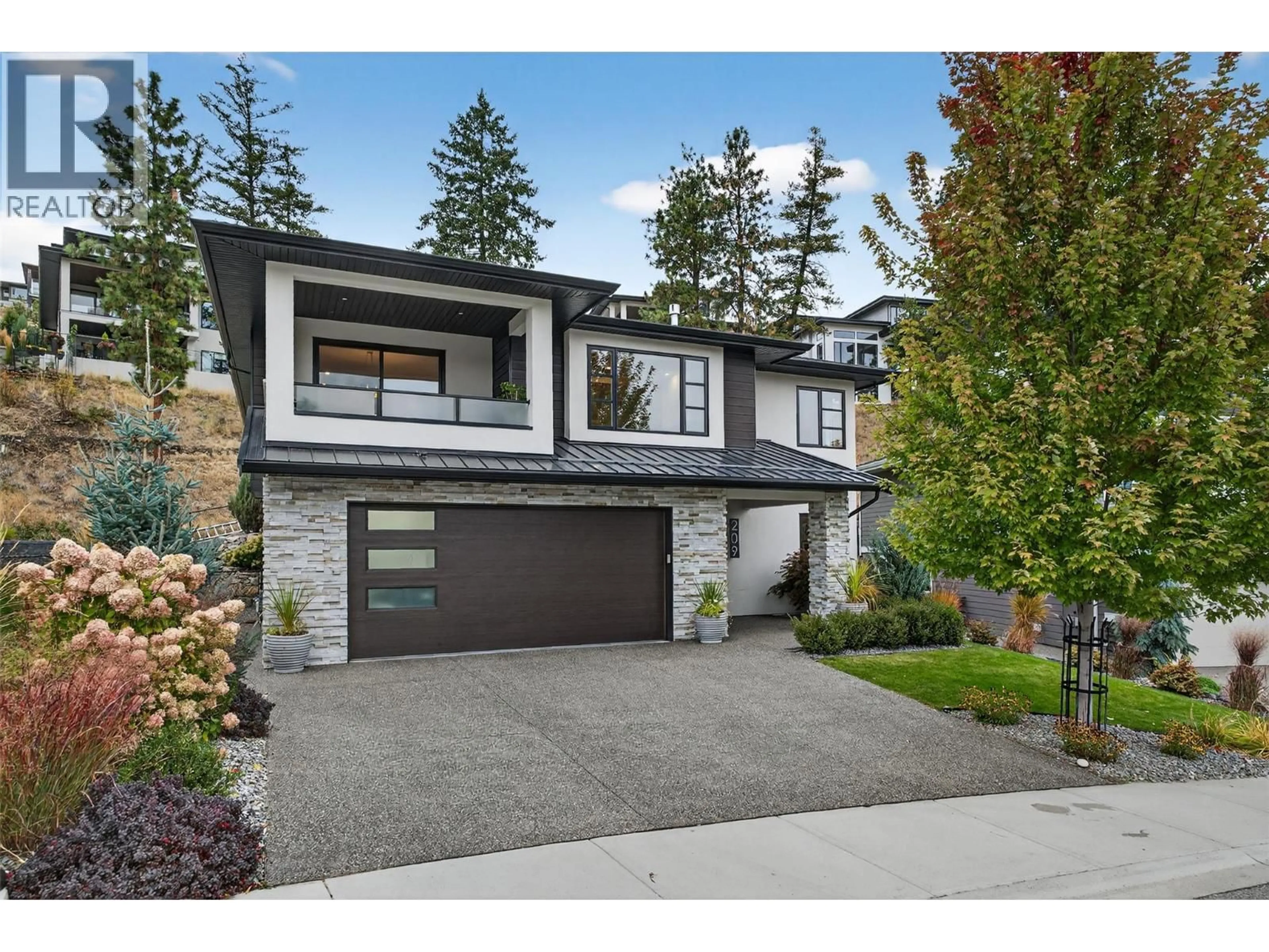 Home with brick exterior material, street for 209 SUMMER WOOD DRIVE, Kelowna British Columbia V1V0C9