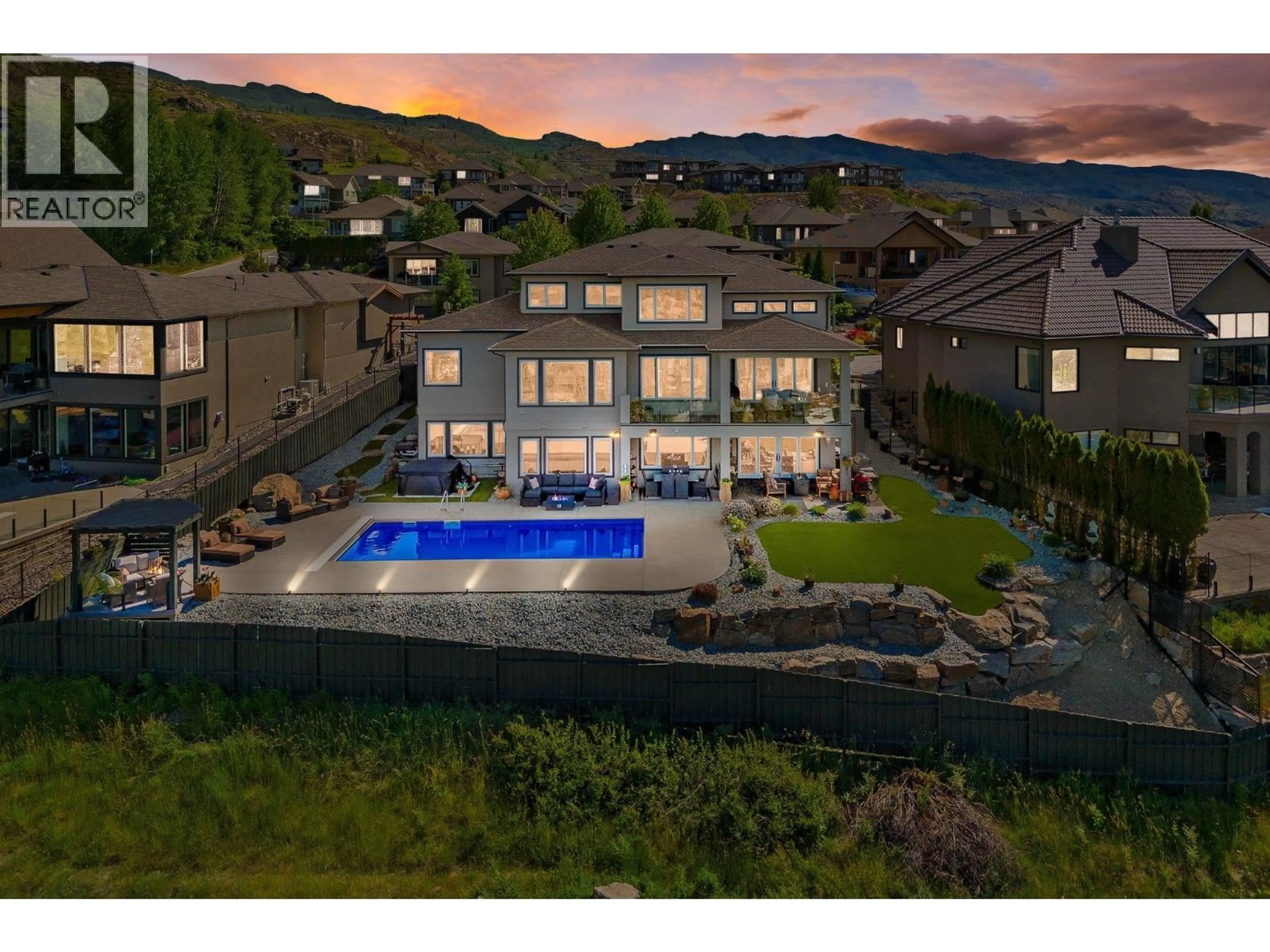 A pic from outside/outdoor area/front of a property/back of a property/a pic from drone, mountain view for 750 KUIPERS CRESCENT, Kelowna British Columbia V1W5H4
