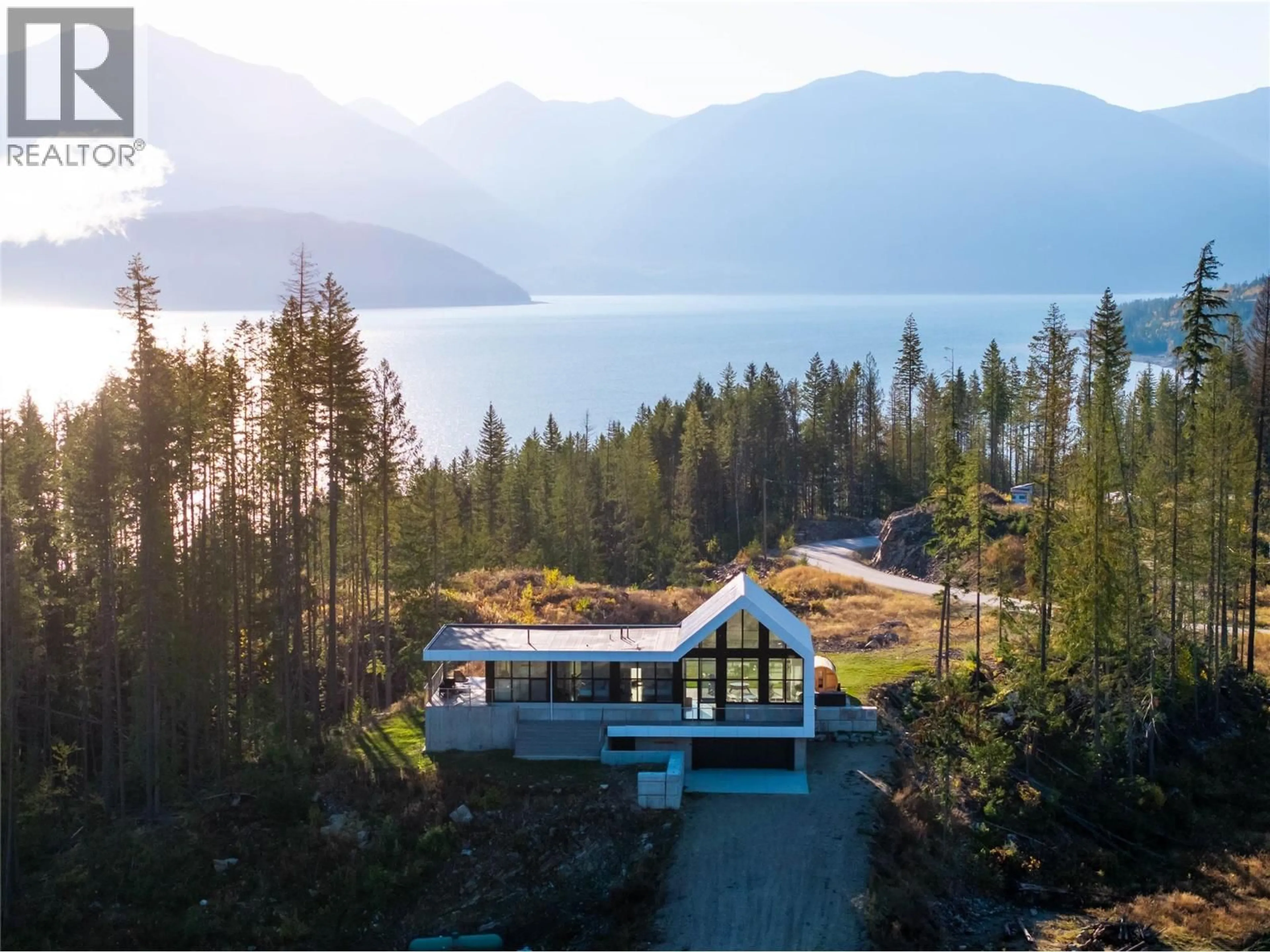 A pic from outside/outdoor area/front of a property/back of a property/a pic from drone, water/lake/river/ocean view for 1950 SIDMOUTH ROAD, Revelstoke British Columbia V0E2S0