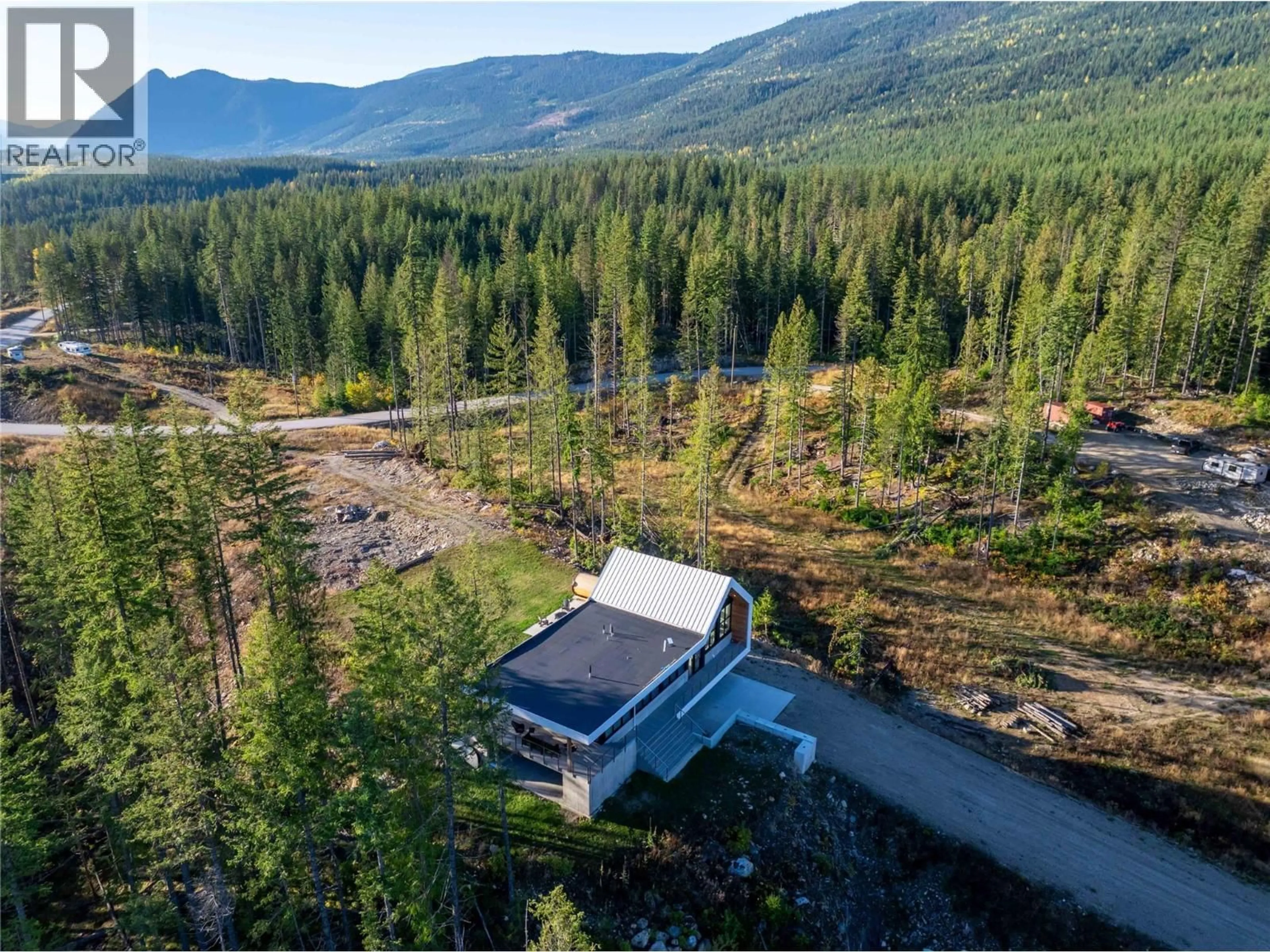 A pic from outside/outdoor area/front of a property/back of a property/a pic from drone, forest/trees view for 1950 SIDMOUTH ROAD, Revelstoke British Columbia V0E2S0