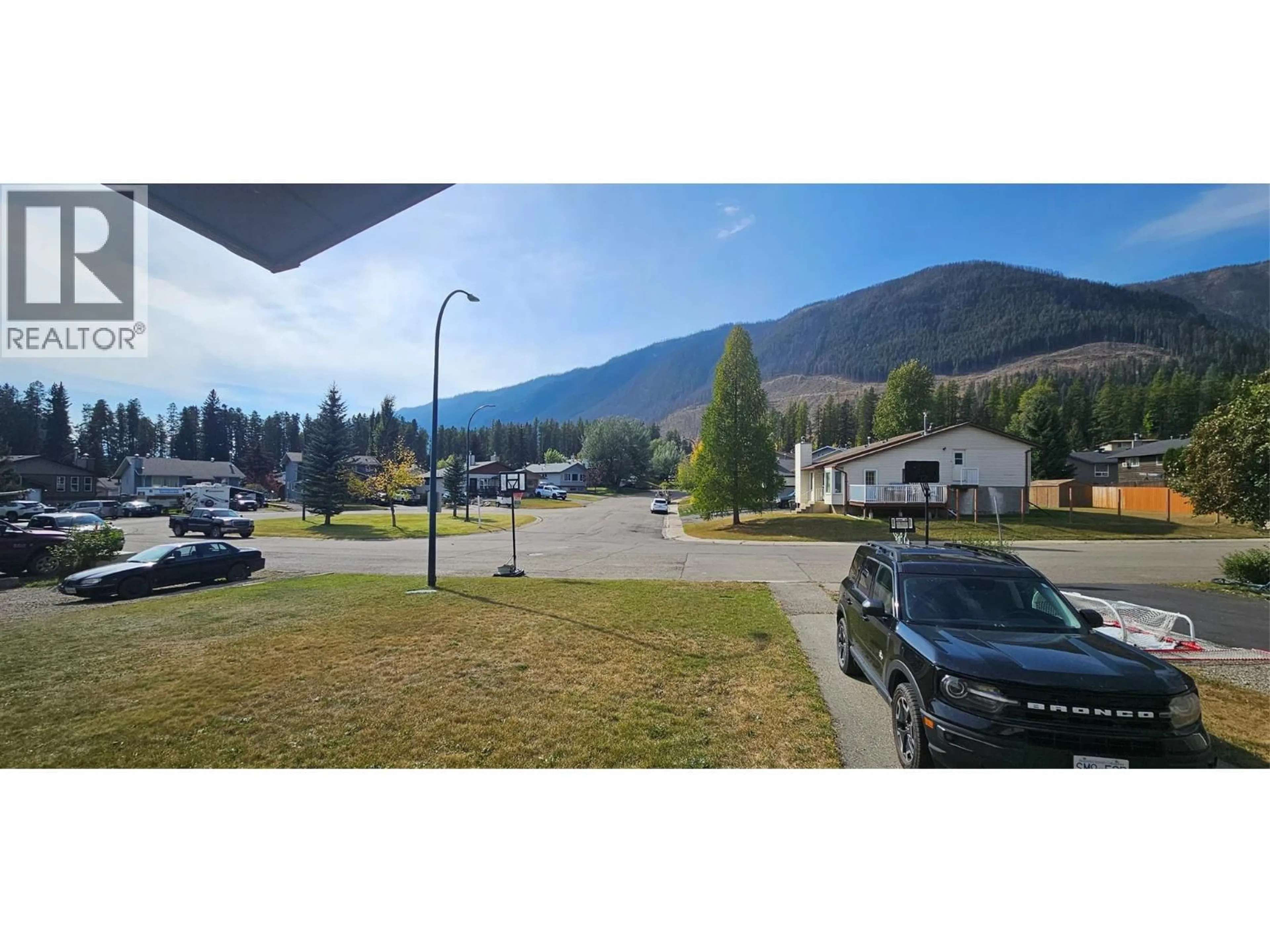 A pic from outside/outdoor area/front of a property/back of a property/a pic from drone, mountain view for 1234 HICKORY CRESCENT, Sparwood British Columbia V0B2G2