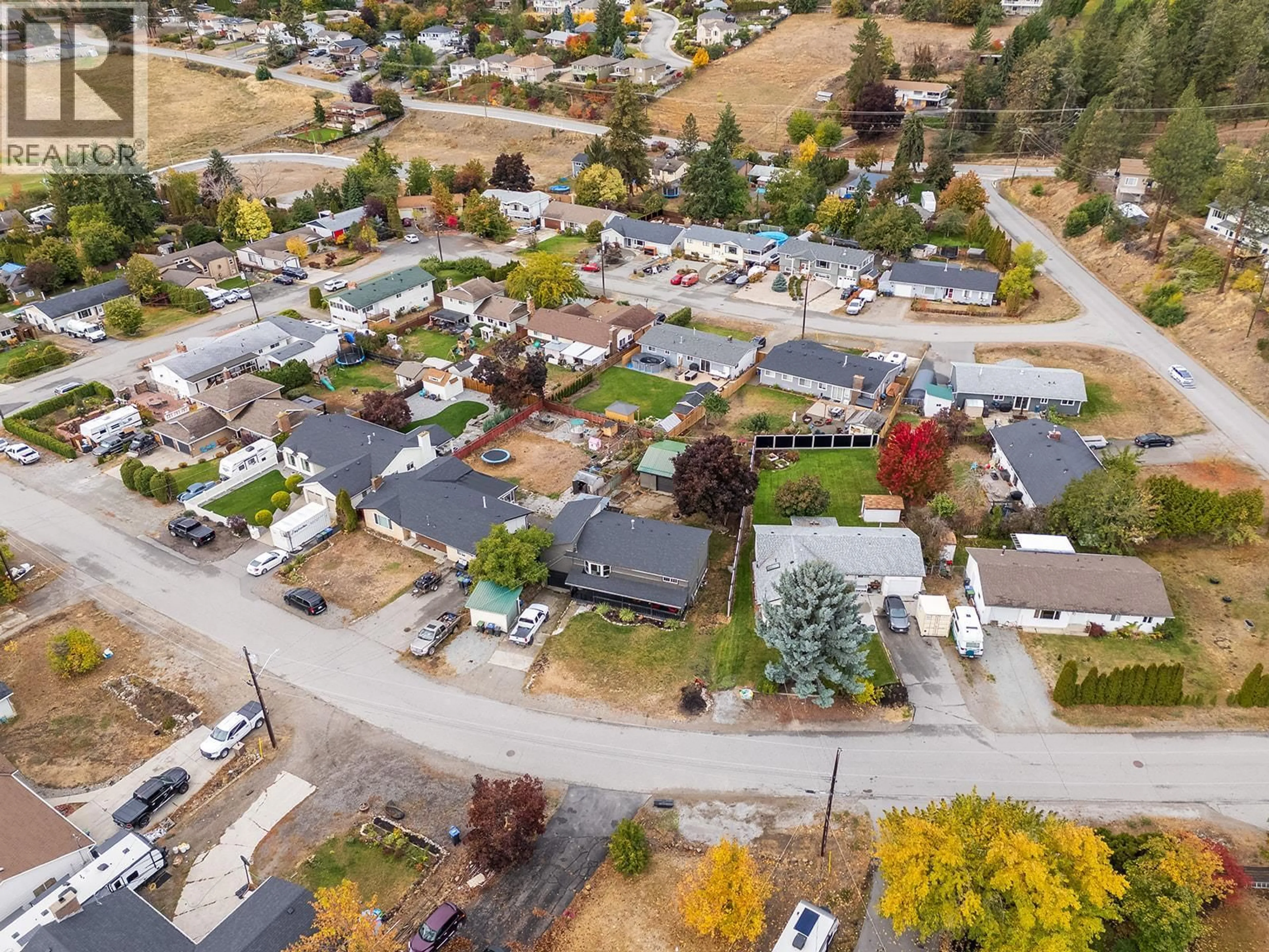 A pic from outside/outdoor area/front of a property/back of a property/a pic from drone, street for 3616 GRANADA CRESCENT, West Kelowna British Columbia V4T1J8