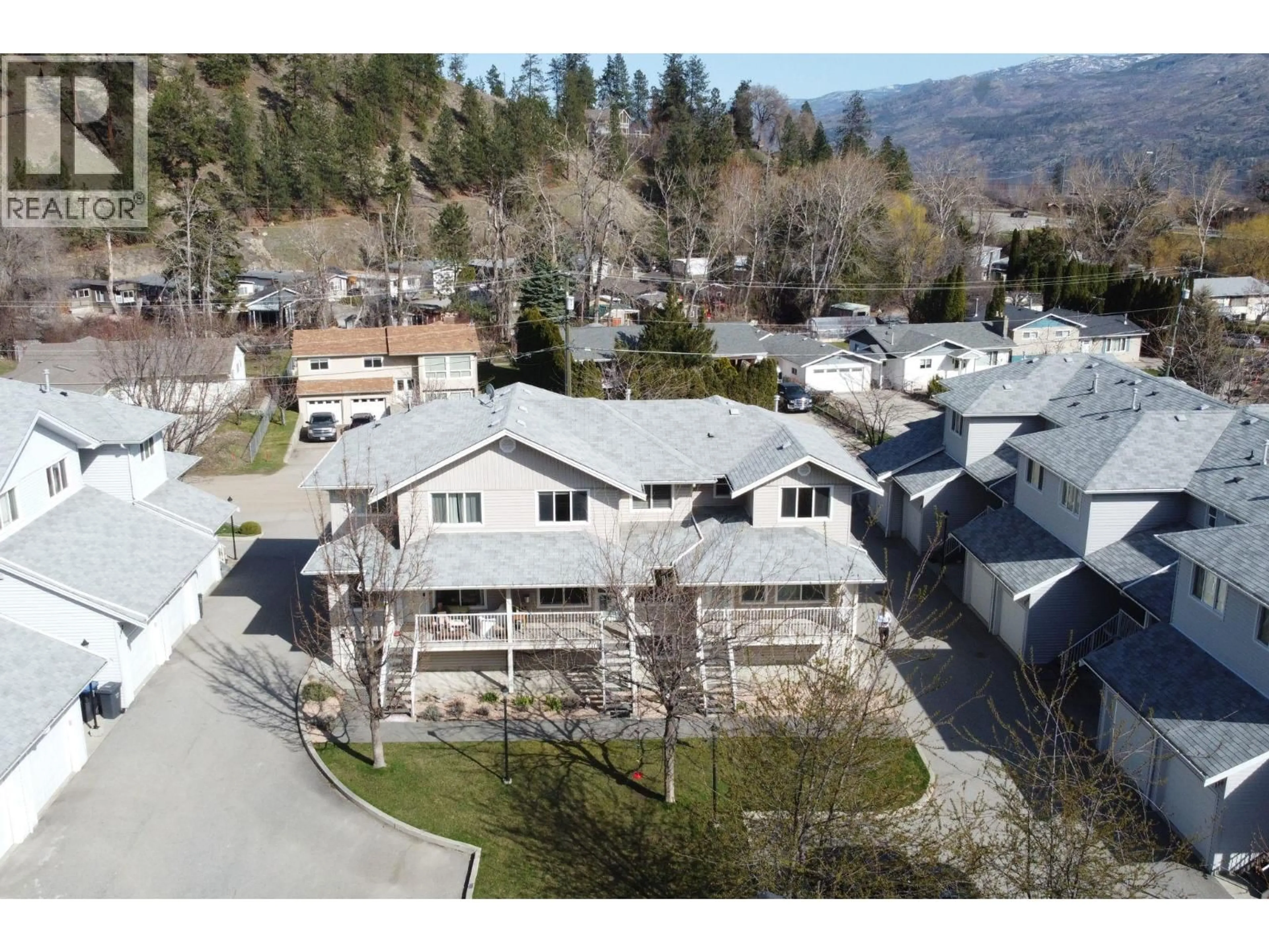 A pic from outside/outdoor area/front of a property/back of a property/a pic from drone, mountain view for 106 - 5460 CLEMENTS CRESCENT, Peachland British Columbia V0H1X5