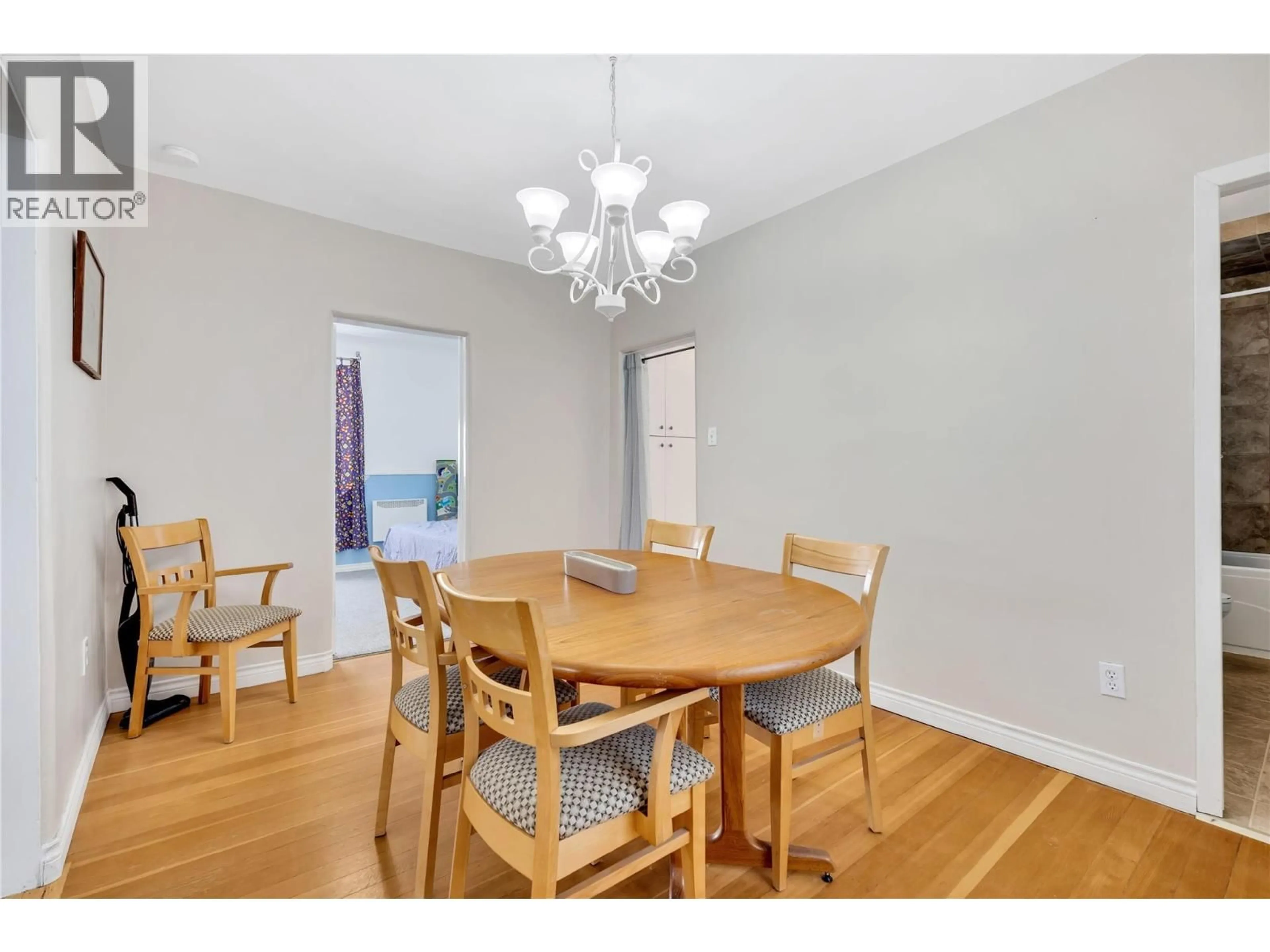 Dining room, wood/laminate floor for 616 BURNS STREET, Penticton British Columbia V2A4X3