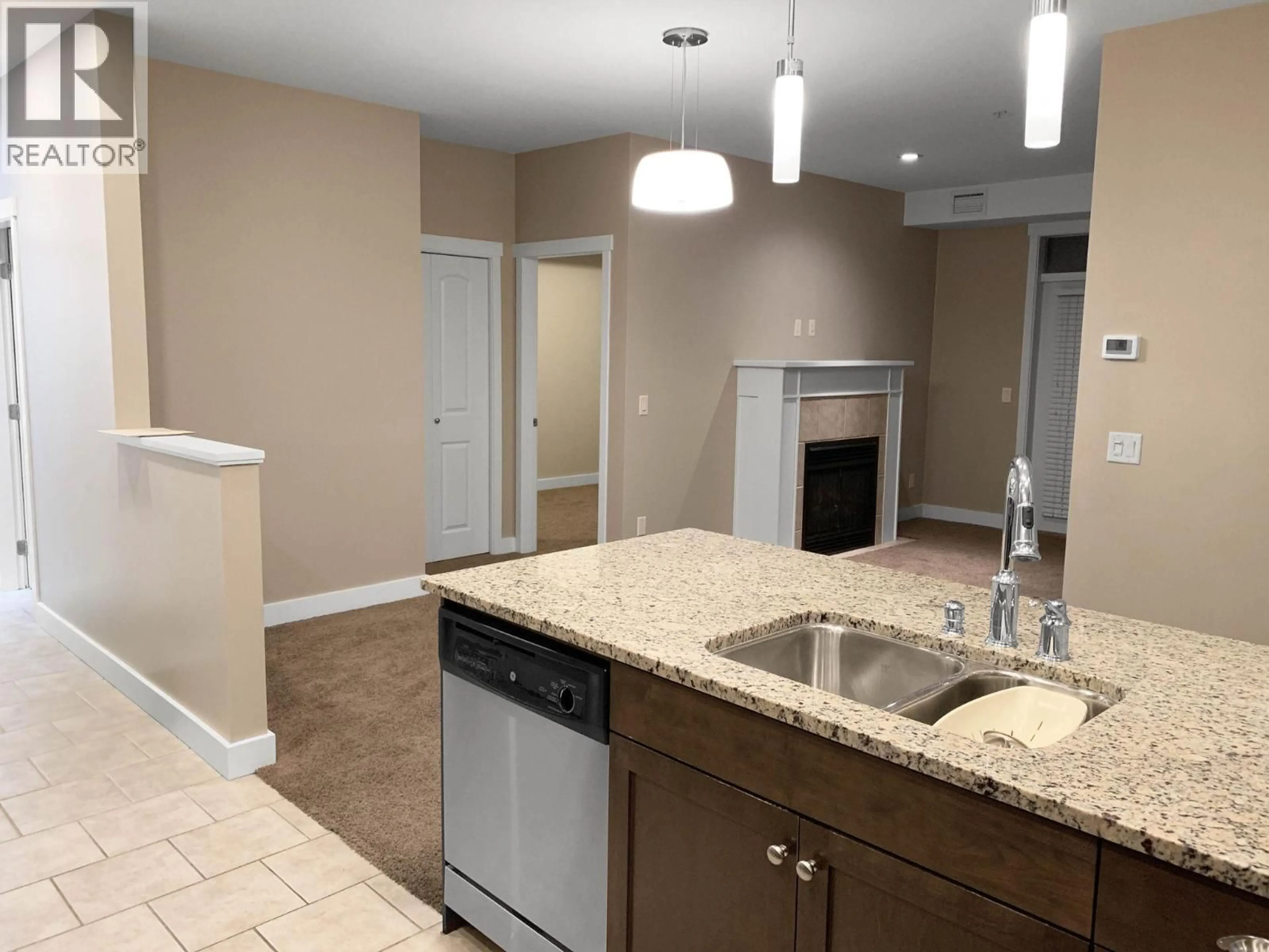 Open concept kitchen, ceramic/tile floor for 2109 - 2200 UPPER SUNDANCE DRIVE, West Kelowna British Columbia V4T3E8